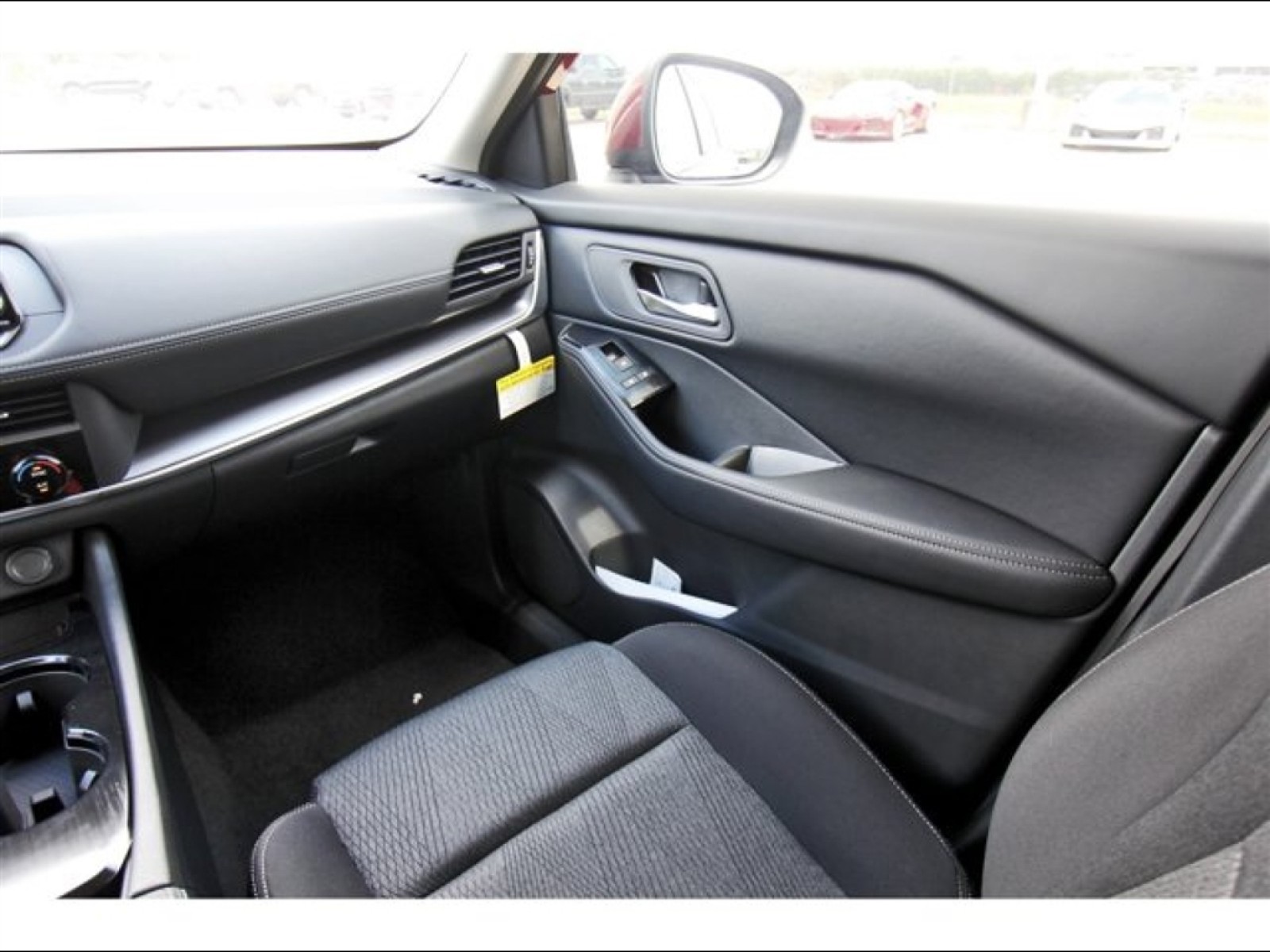 2026 Nissan Rogue SV Red at Robbins Nissan