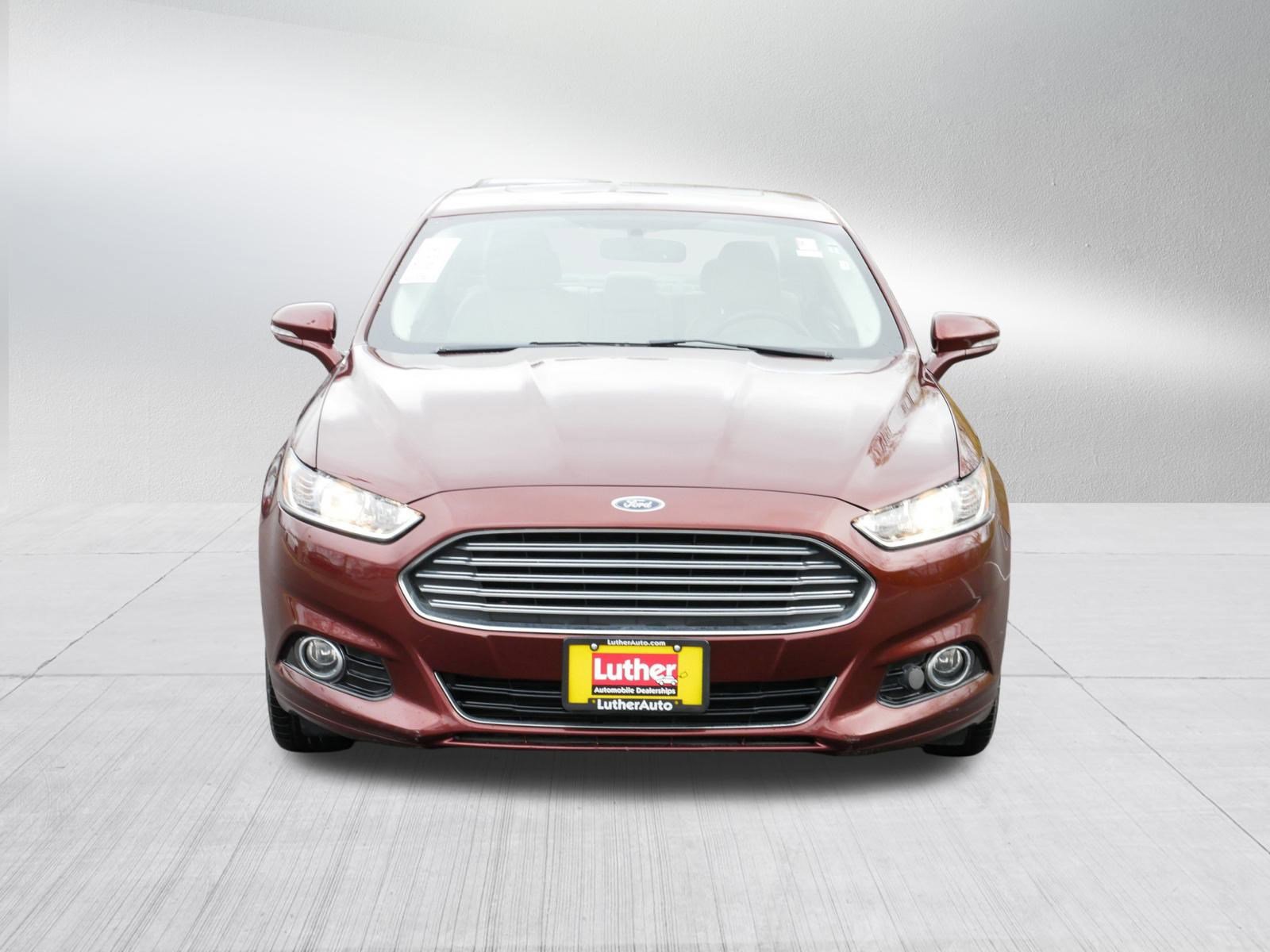 Used 2015 Ford Fusion Hybrid Titanium with VIN 3FA6P0RUXFR305368 for sale in Hopkins, Minnesota