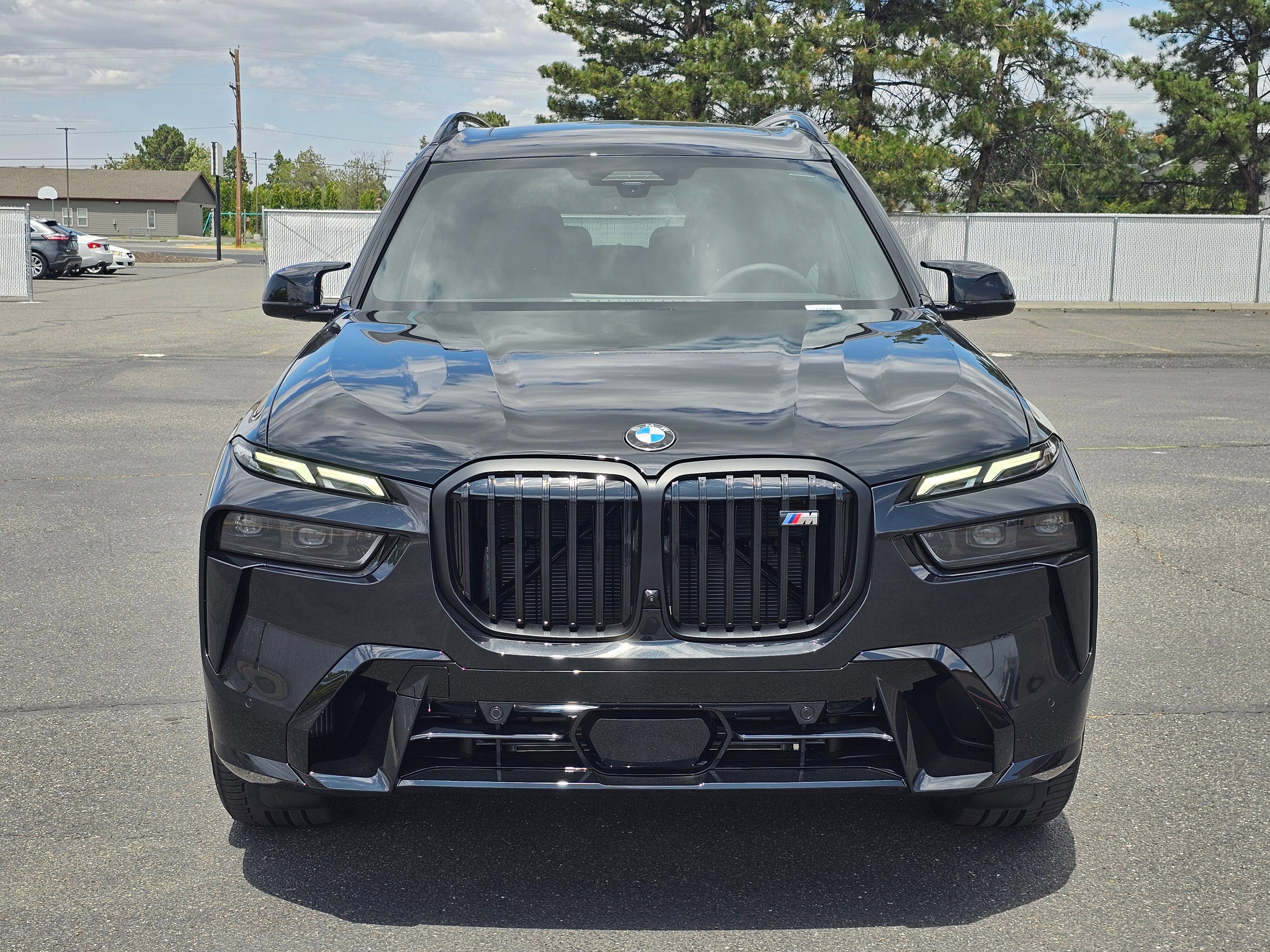 New 2026 Black Sapphire Metallic BMW M60i image 6