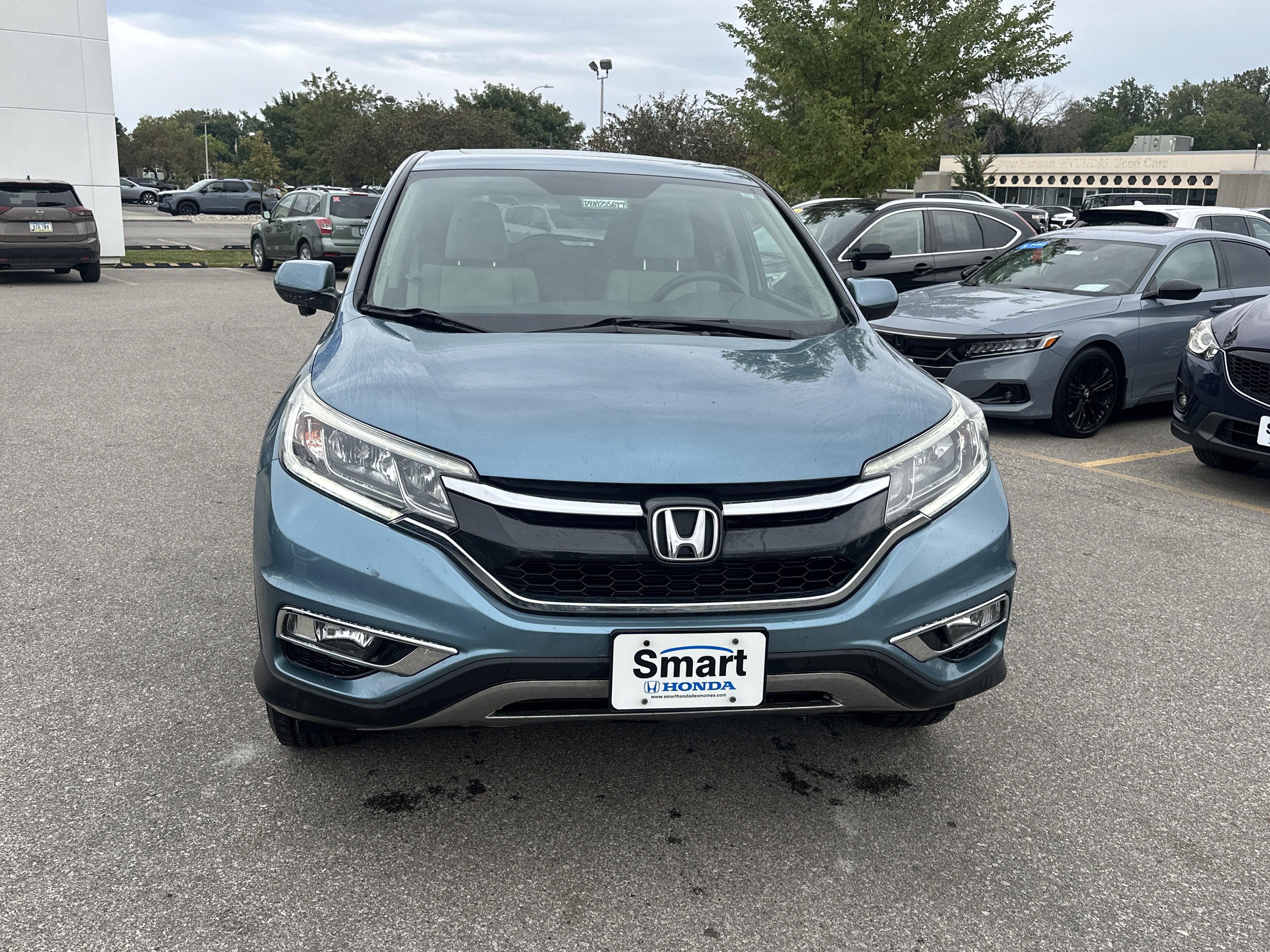 Used 2016 Honda CR-V EX with VIN 5J6RM4H54GL055699 for sale in Des Moines, IA