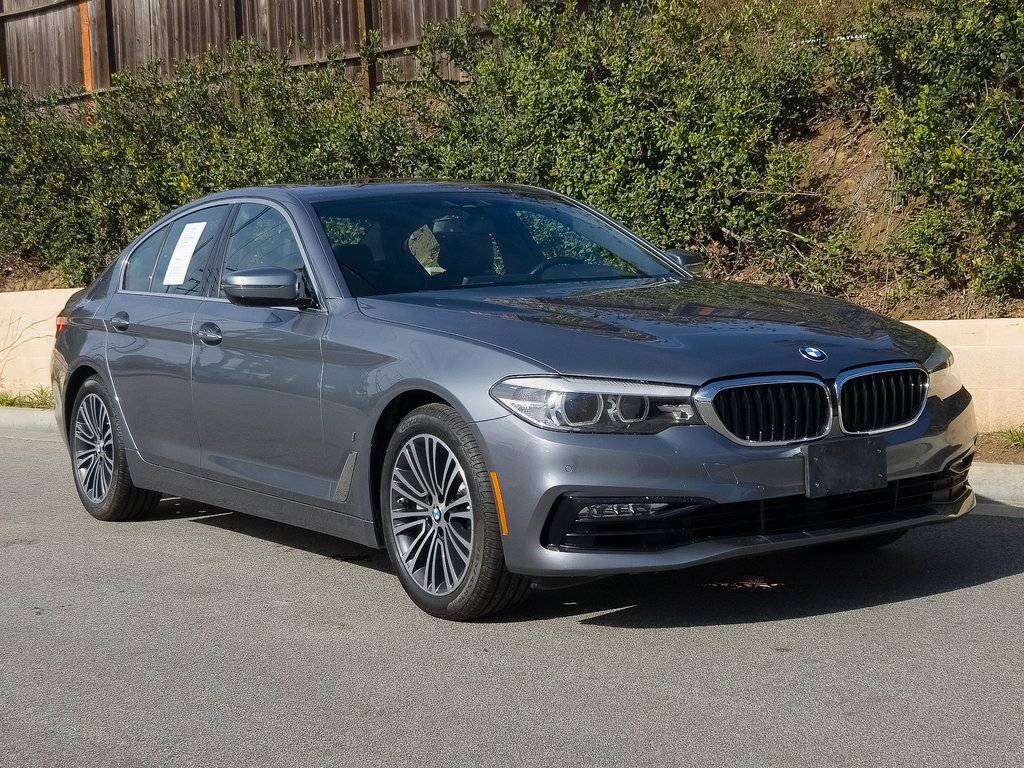 Used 2018 BMW 5 Series 530e with VIN WBAJA9C55JB033947 for sale in Newport Beach, CA