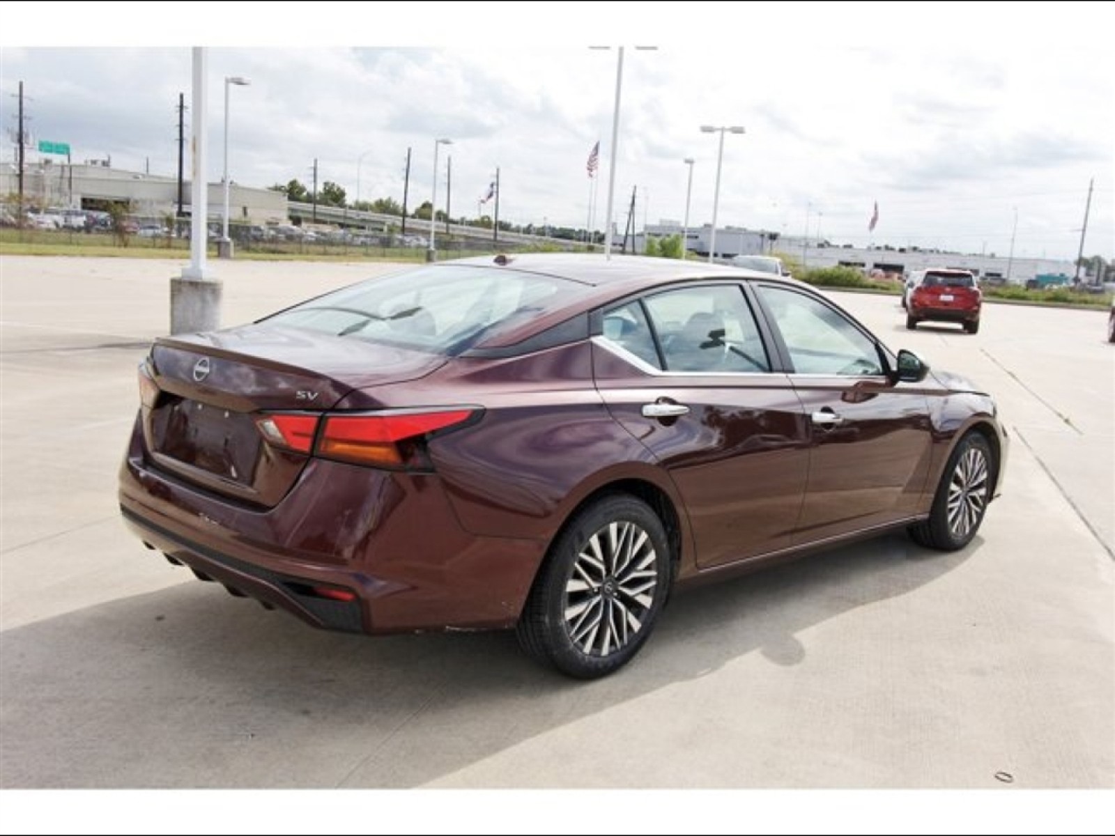 2024 Nissan Altima 2.5 SV Red at Robbins Nissan