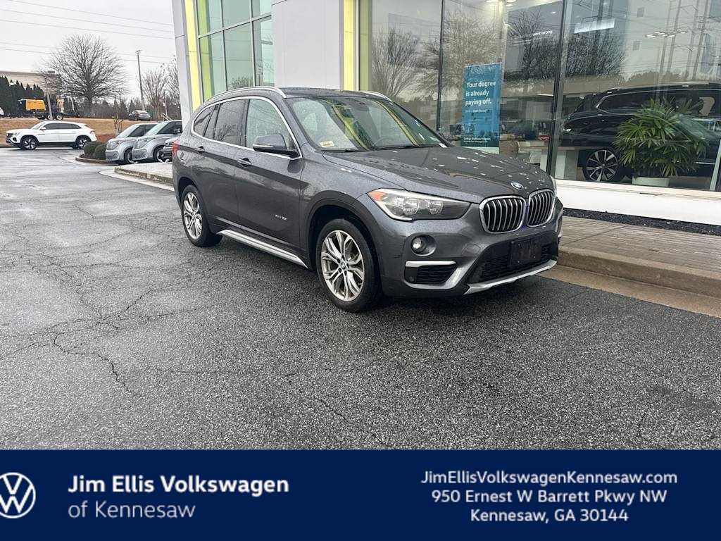Used 2017 BMW X1 28i with VIN WBXHT3C34H5F77023 for sale in Kennesaw, GA