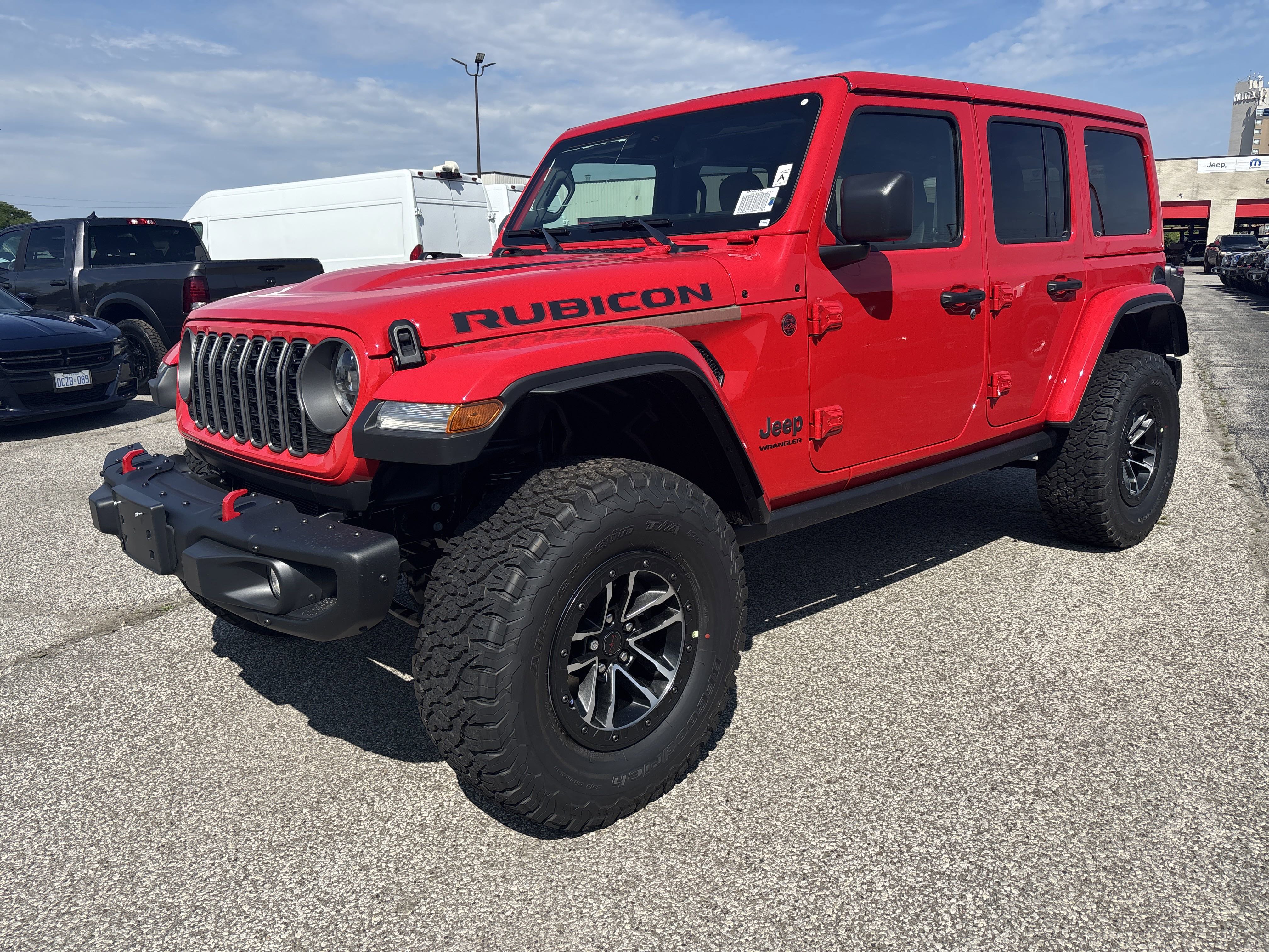 New 2025 Firecracker Red Jeep Rubicon X image 1