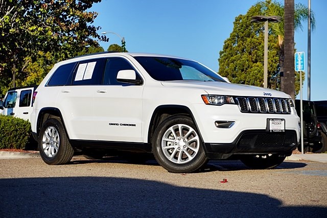 Used 2021 White Jeep Laredo E image 1