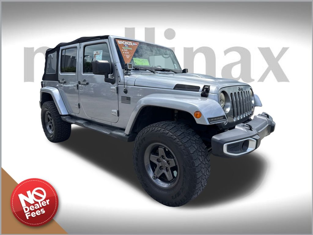 Used 2013 Jeep Wrangler Unlimited Freedom Edition with VIN 1C4BJWDGXDL604126 for sale in Lake Park, FL