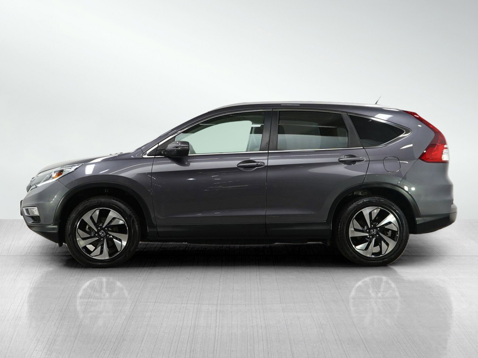 Used 2016 Honda CR-V Touring with VIN 5J6RM4H94GL102619 for sale in Minneapolis, Minnesota