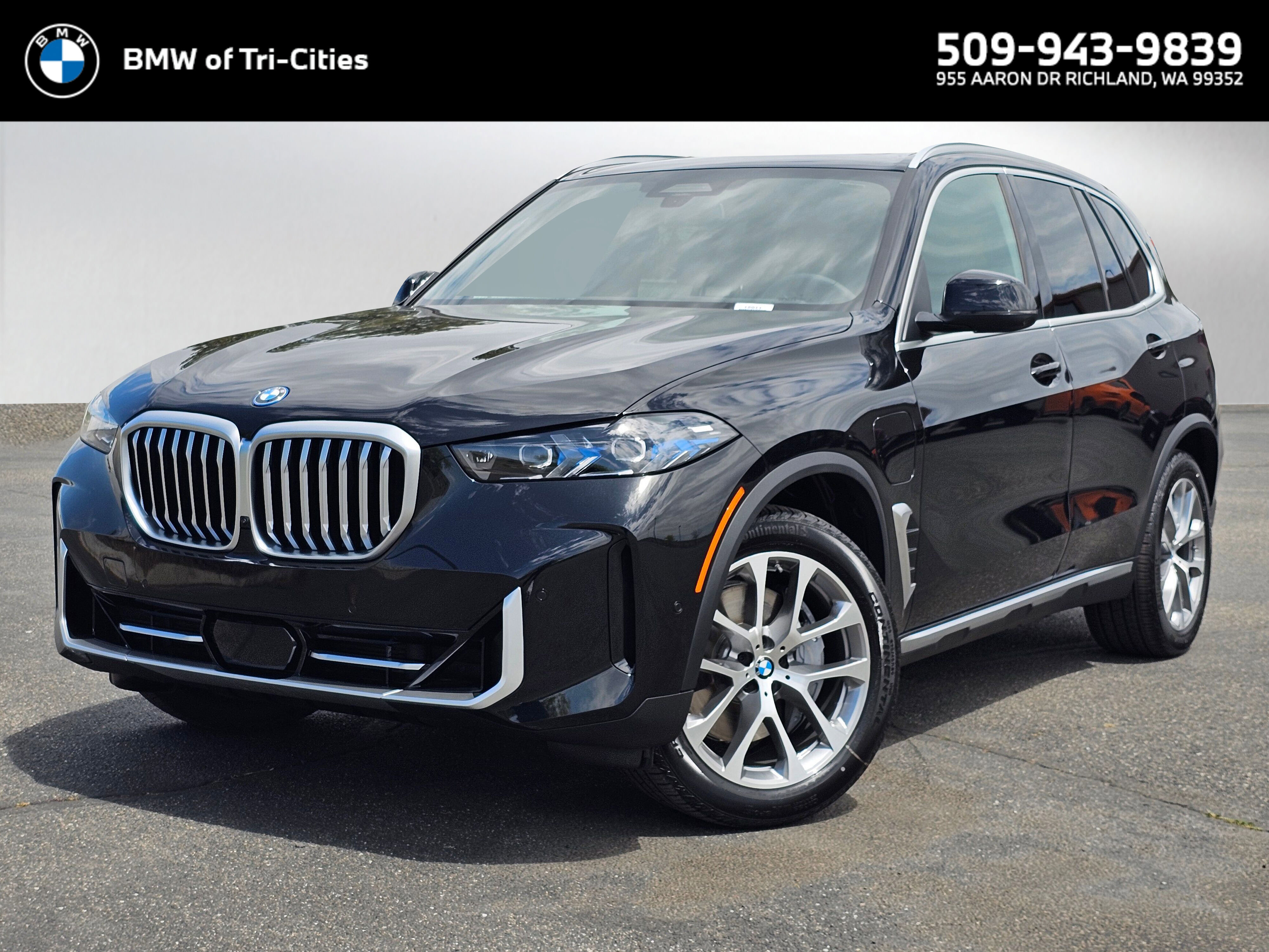 New 2026 Black Sapphire Metallic BMW xDrive50e image 1