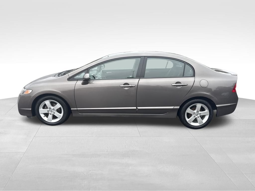 Used 2011 Honda Civic LX-S with VIN 19XFA1F60BE013611 for sale in Sanford, NC