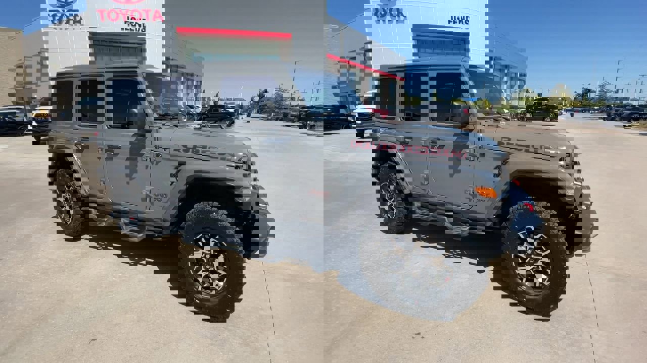 Used 2021 Jeep Wrangler Unlimited Rubicon with VIN 1C4HJXFGXMW593186 for sale in Kansas City
