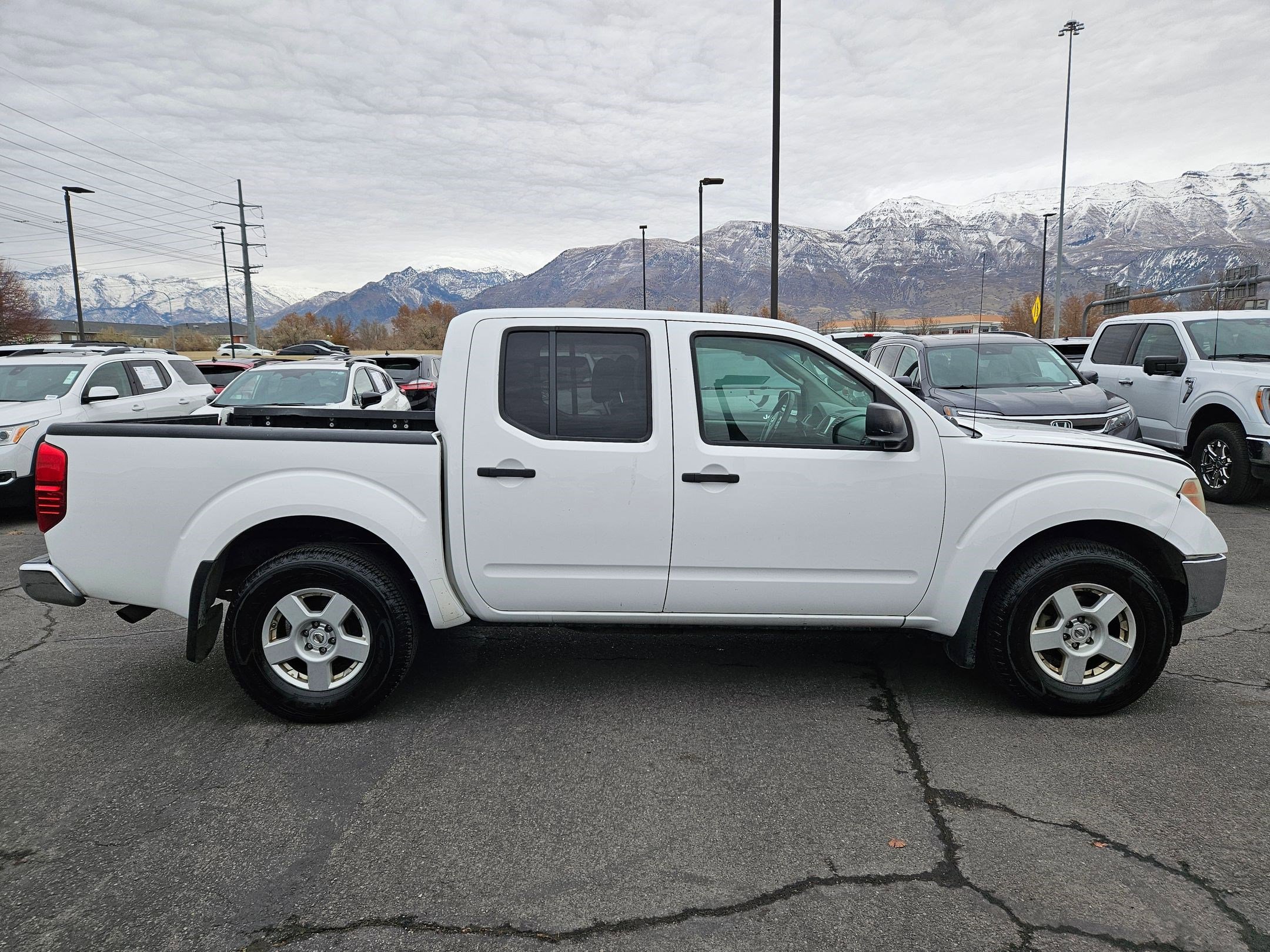 Used 2006 Nissan Frontier SE with VIN 1N6AD07W06C401989 for sale in American Fork, UT