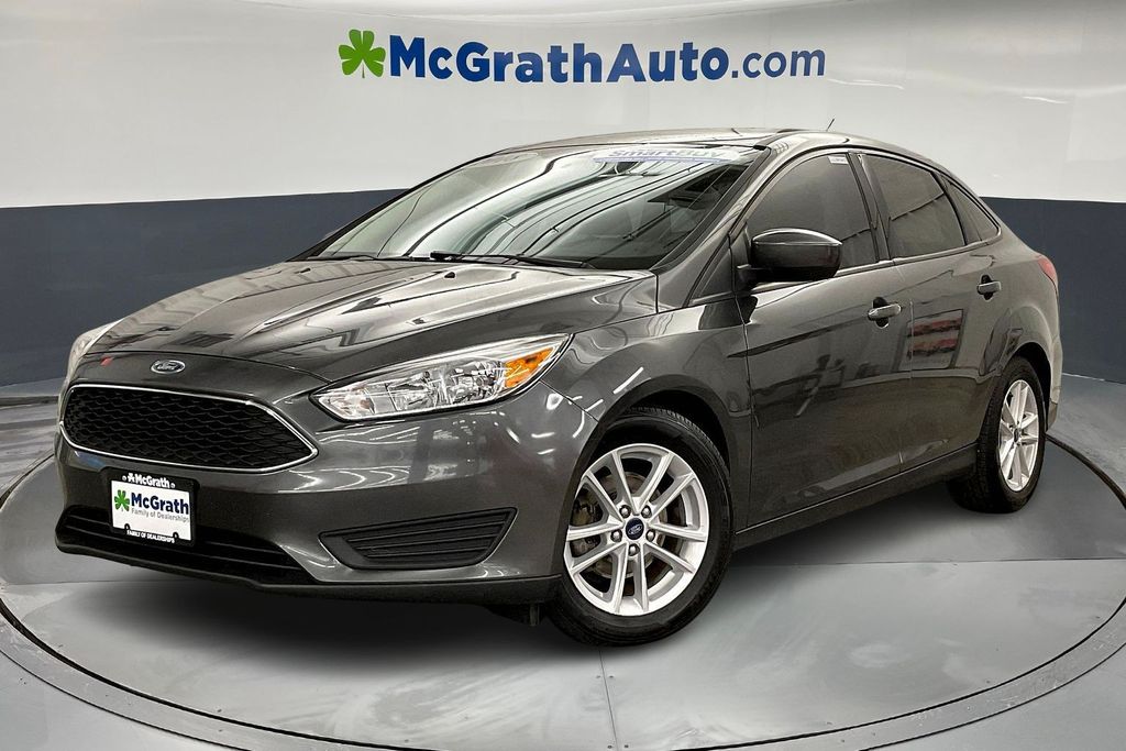 Used 2018 Ford Focus SE with VIN 1FADP3F21JL269847 for sale in Iowa City, IA
