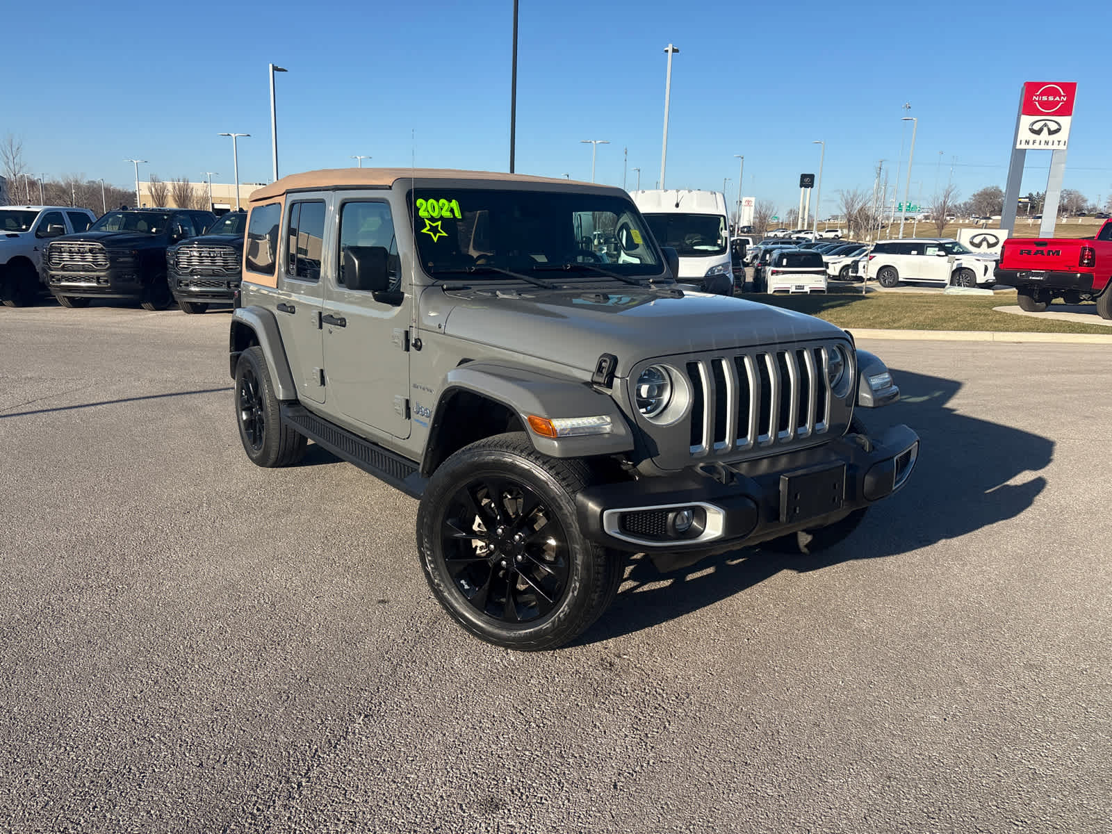 Used 2021 Jeep Wrangler Unlimited Sahara 4XE with VIN 1C4JJXP68MW787643 for sale in Kansas City