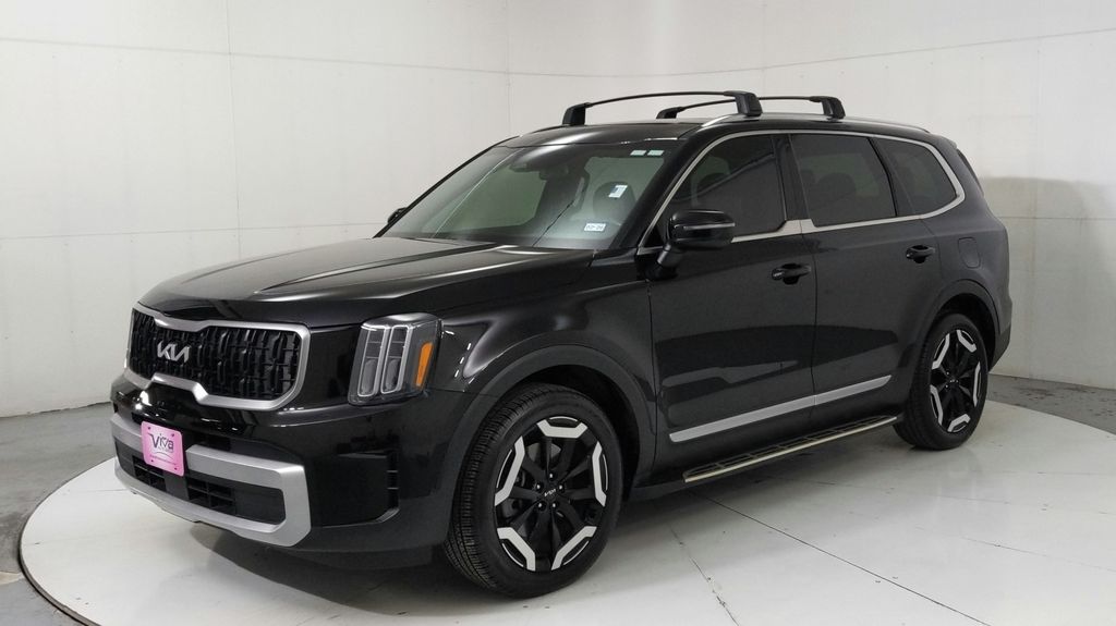 Used 2024 Black Kia EX image 1