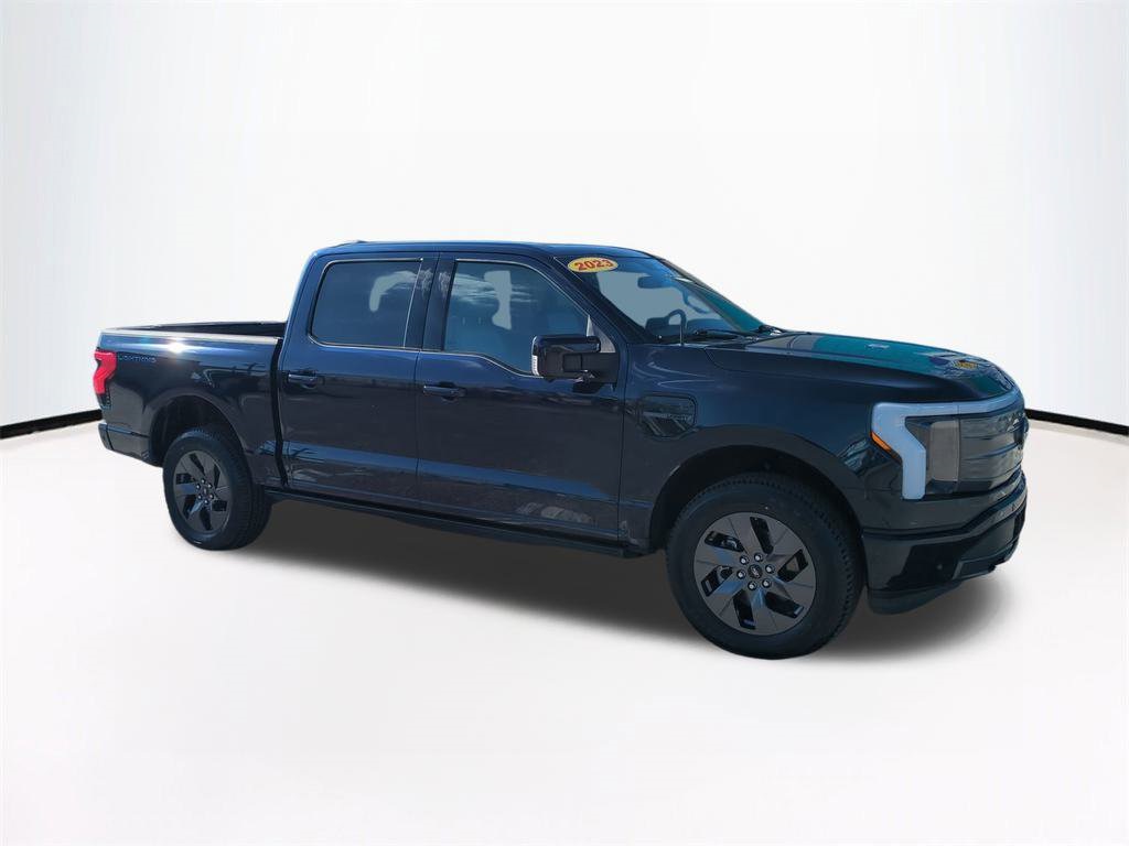 Used 2023 Ford F-150 Lightning Lariat with VIN 1FTVW1EV1PWG28610 for sale in Tampa, FL