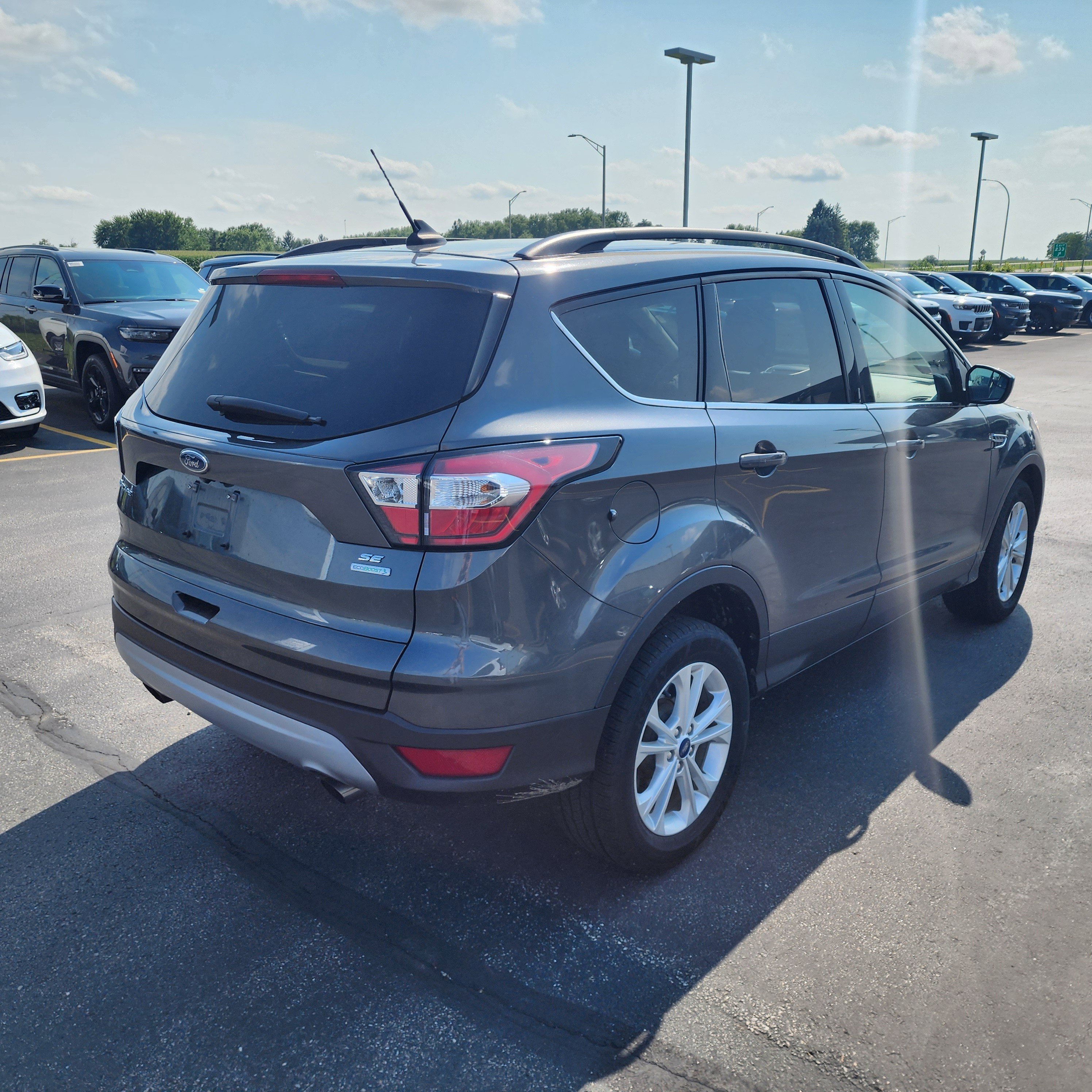 Used 2018 Ford Escape SE with VIN 1FMCU0GD9JUD55569 for sale in Burnsville, Minnesota