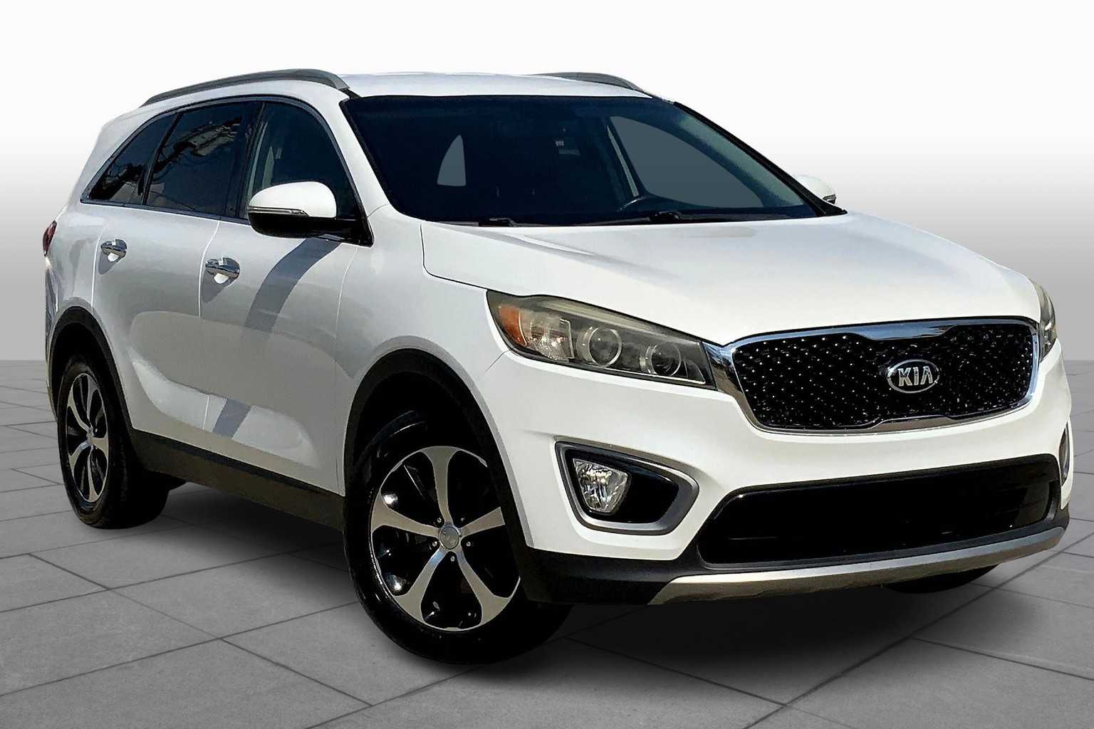Used 2016 Kia Sorento EX with VIN 5XYPH4A11GG020803 for sale in Sugar Land, TX