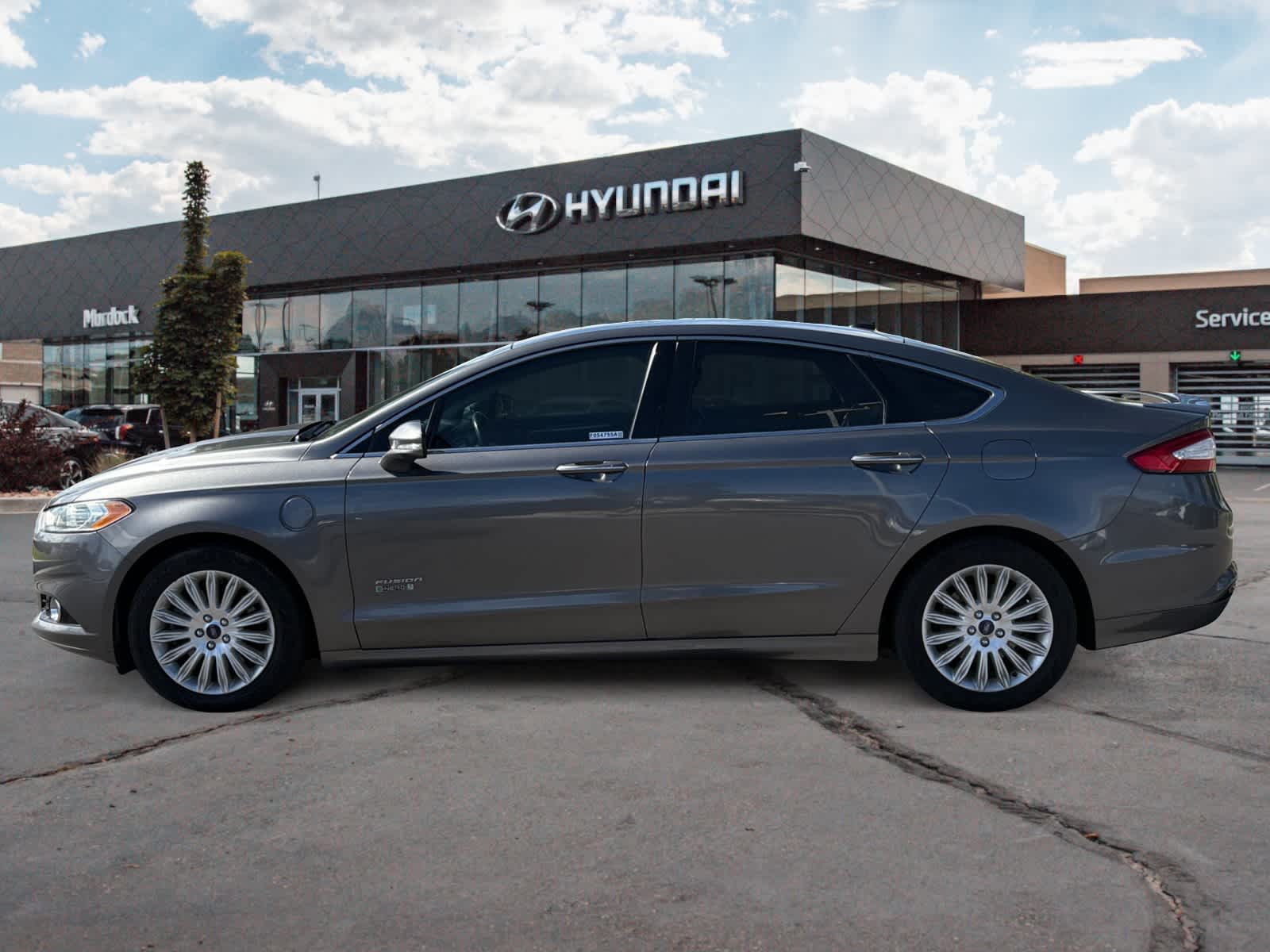 Used 2014 Ford Fusion Energi Titanium with VIN 3FA6P0SU4ER142077 for sale in Lindon, UT