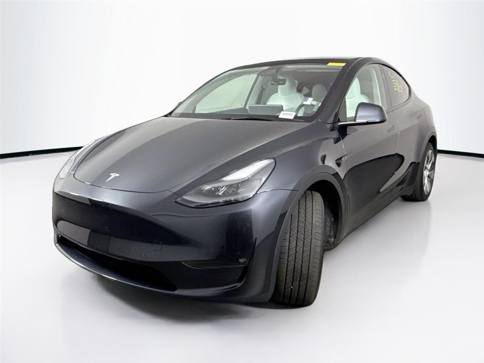 Used 2024 Tesla Model Y Long Range with VIN 7SAYGAEE2RF990806 for sale in Cumming, GA