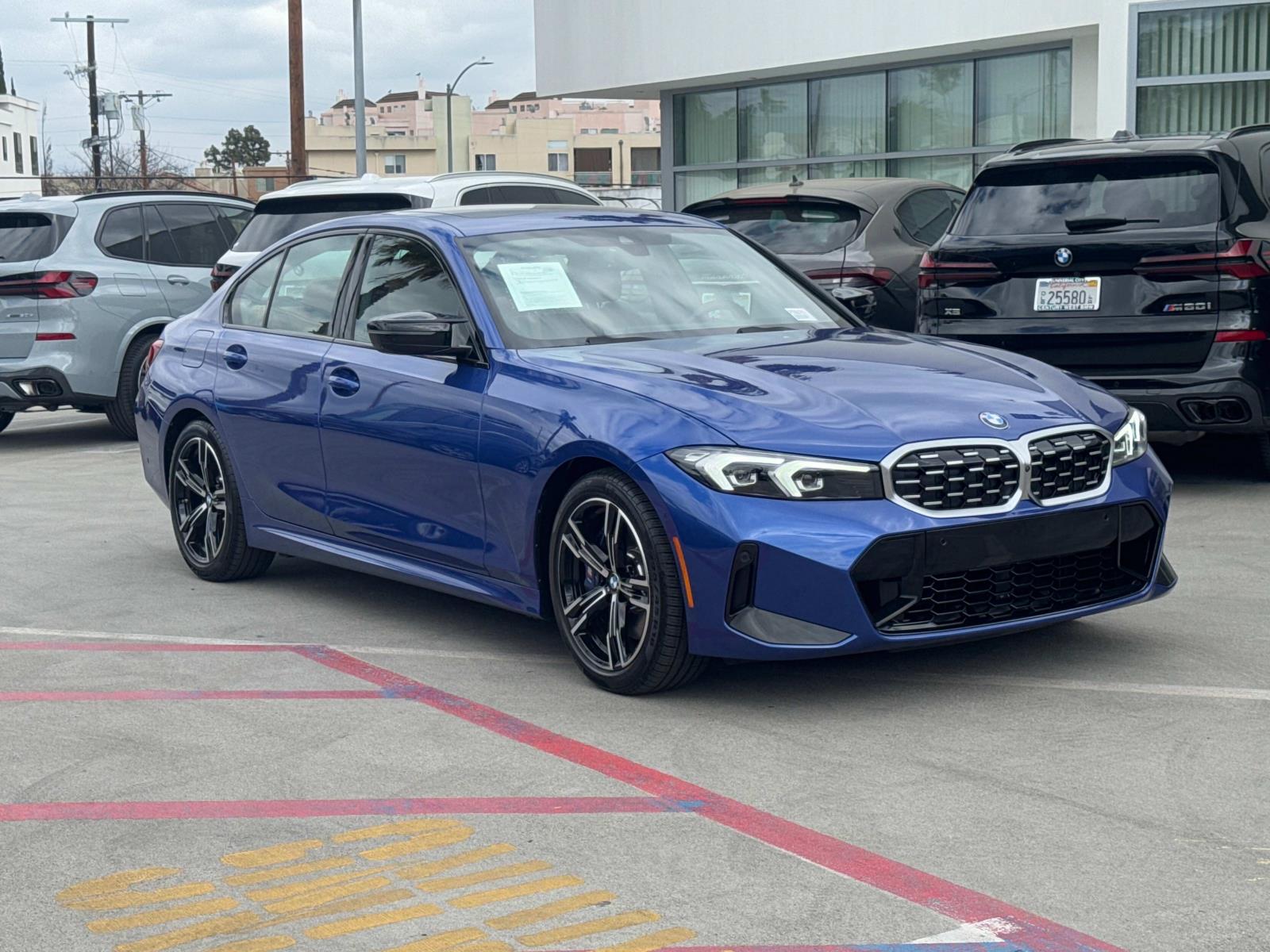 Used 2024 Portimao Blue Metallic BMW M340i Sedan image 1