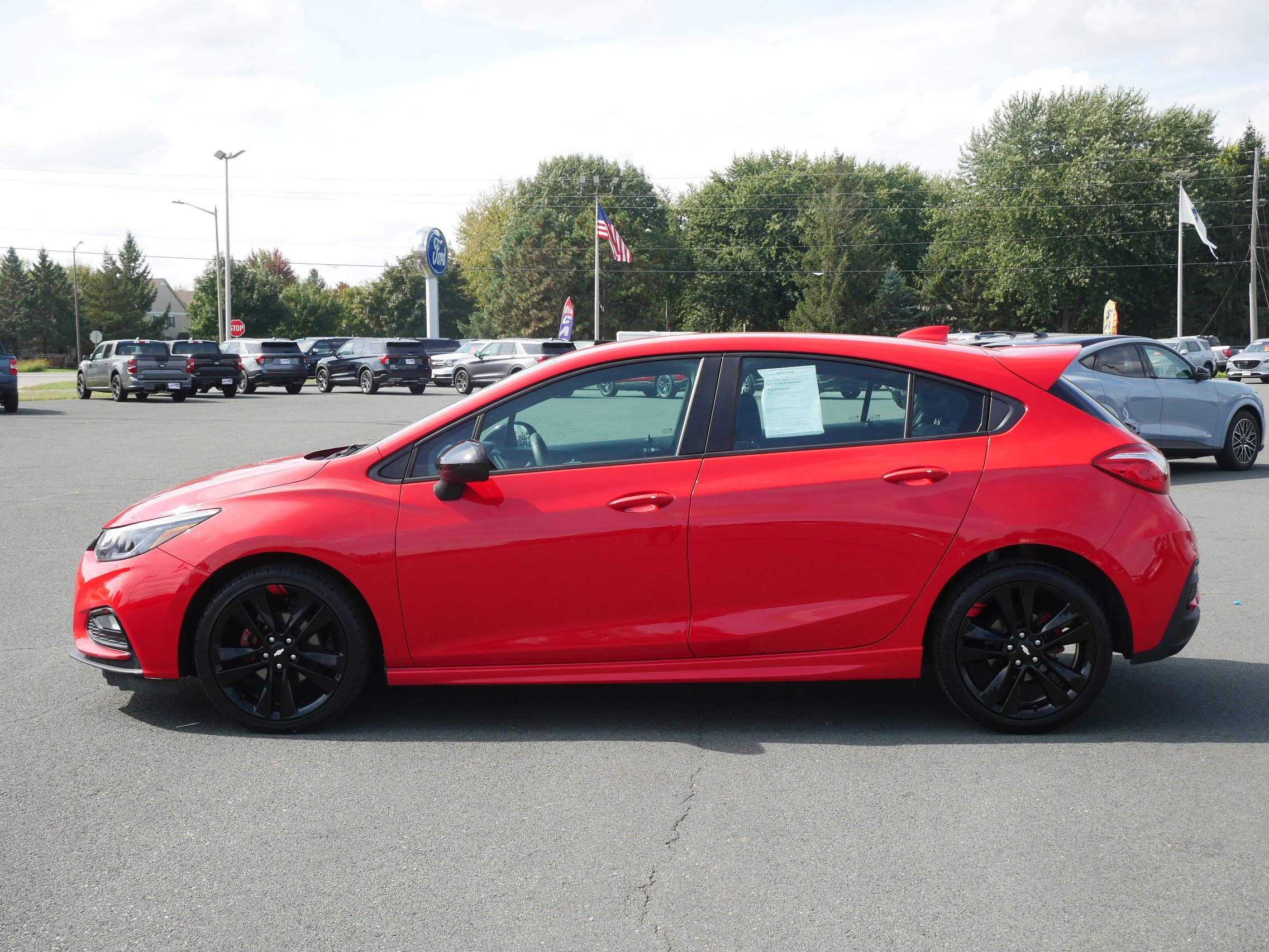 Used 2018 Chevrolet Cruze LT with VIN 3G1BE6SM2JS651047 for sale in Hastings, Minnesota