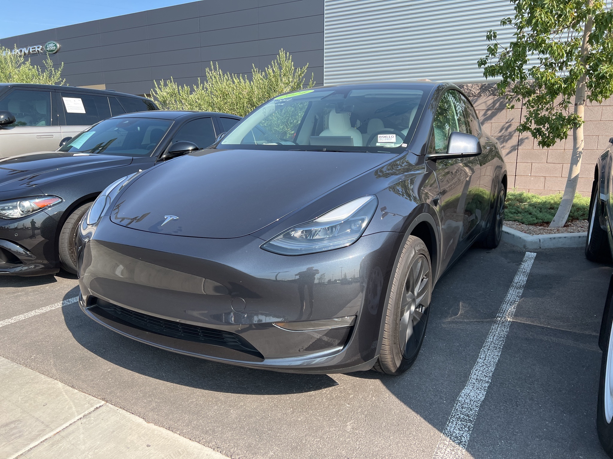 Used 2024 Tesla Model Y Long Range with VIN 7SAYGDED7RF127413 for sale in Henderson, NV