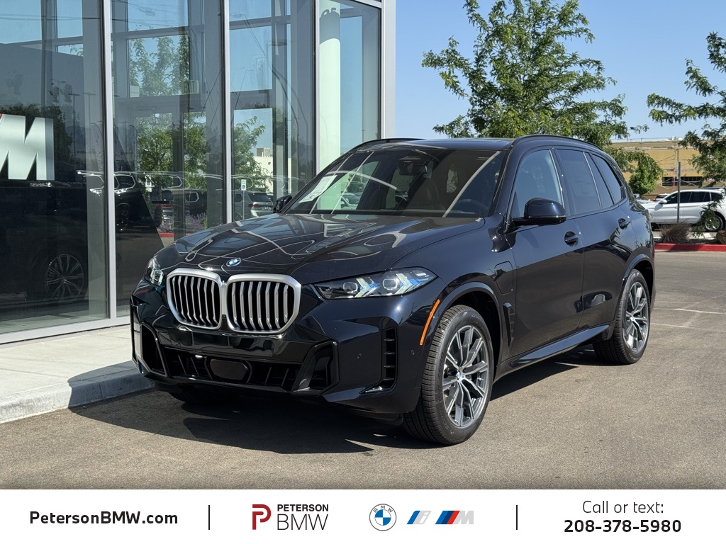 New 2026 Carbon Black Metallic BMW xDrive50e image 1