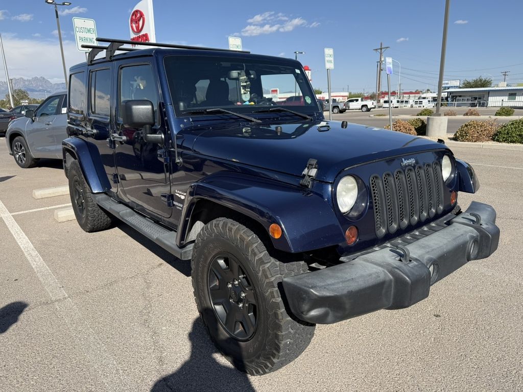 Used 2013 Blue Jeep Unlimited Sahara image 3