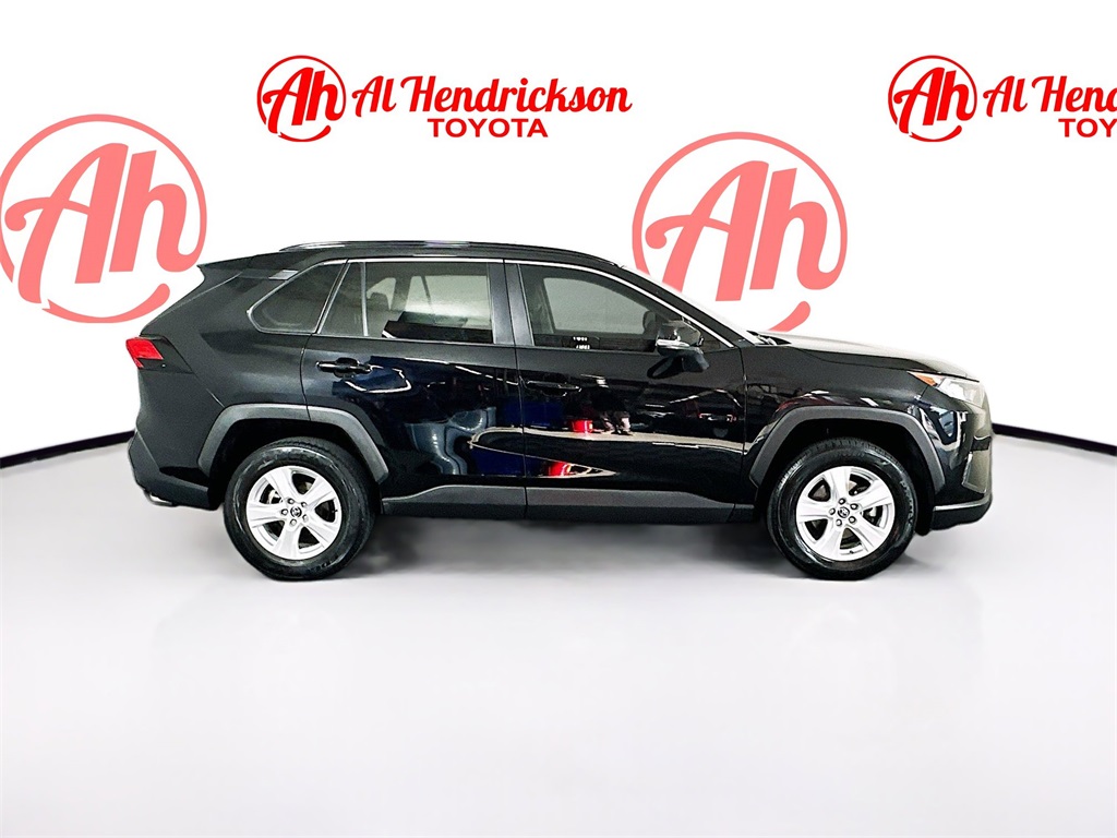 Used 2021 Toyota RAV4 XLE with VIN 2T3W1RFV1MW106456 for sale in Kansas City