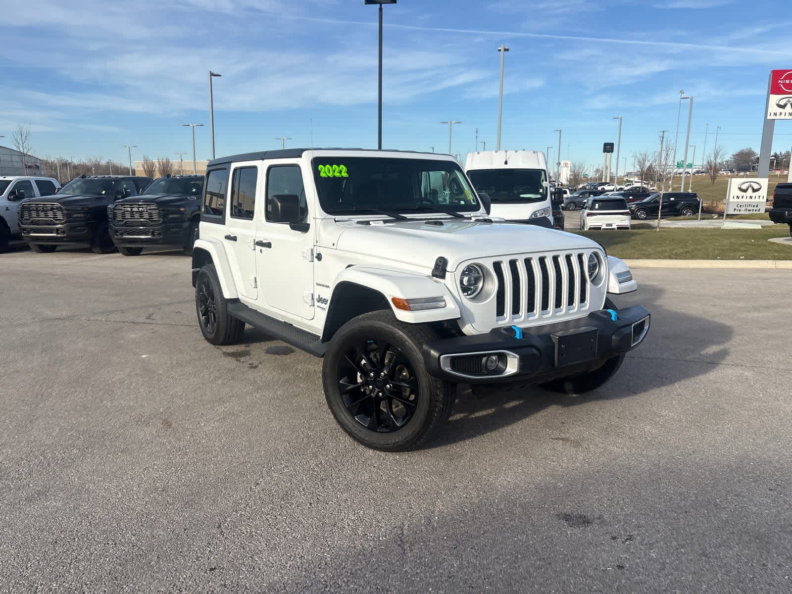 Used 2022 Jeep Wrangler Unlimited Sahara 4XE with VIN 1C4JJXP63NW266377 for sale in Kansas City