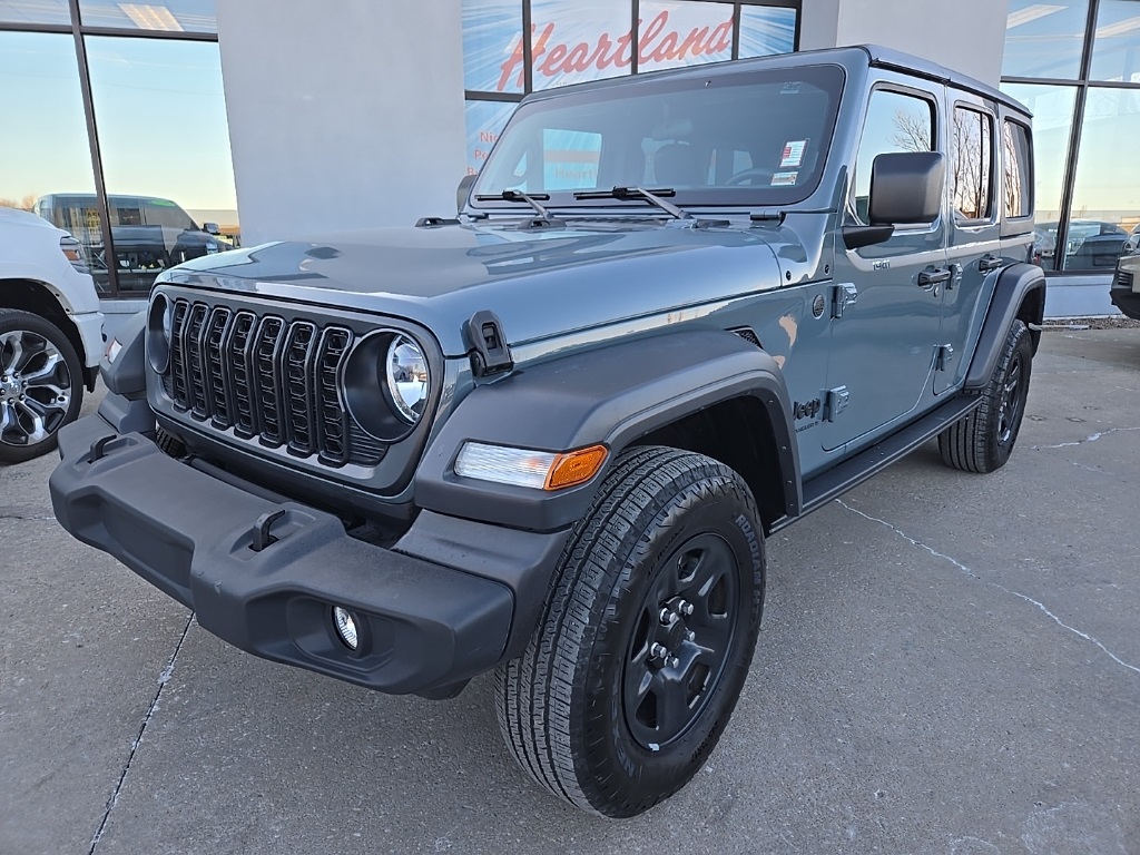 Used 2024 Jeep Wrangler 4-Door Sport with VIN 1C4PJXDG5RW357616 for sale in Kansas City