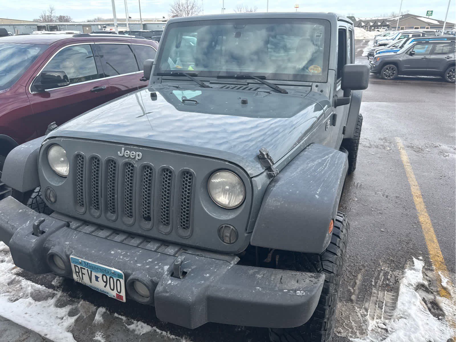 Used 2014 Jeep Wrangler Unlimited Sport with VIN 1C4BJWDG6EL250218 for sale in Cambridge, MN