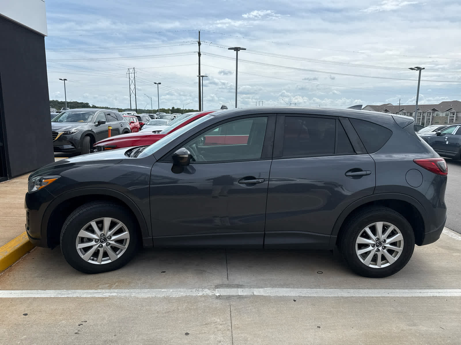 Used 2016 Mazda CX-5 Touring with VIN JM3KE4CY3G0850936 for sale in Kansas City