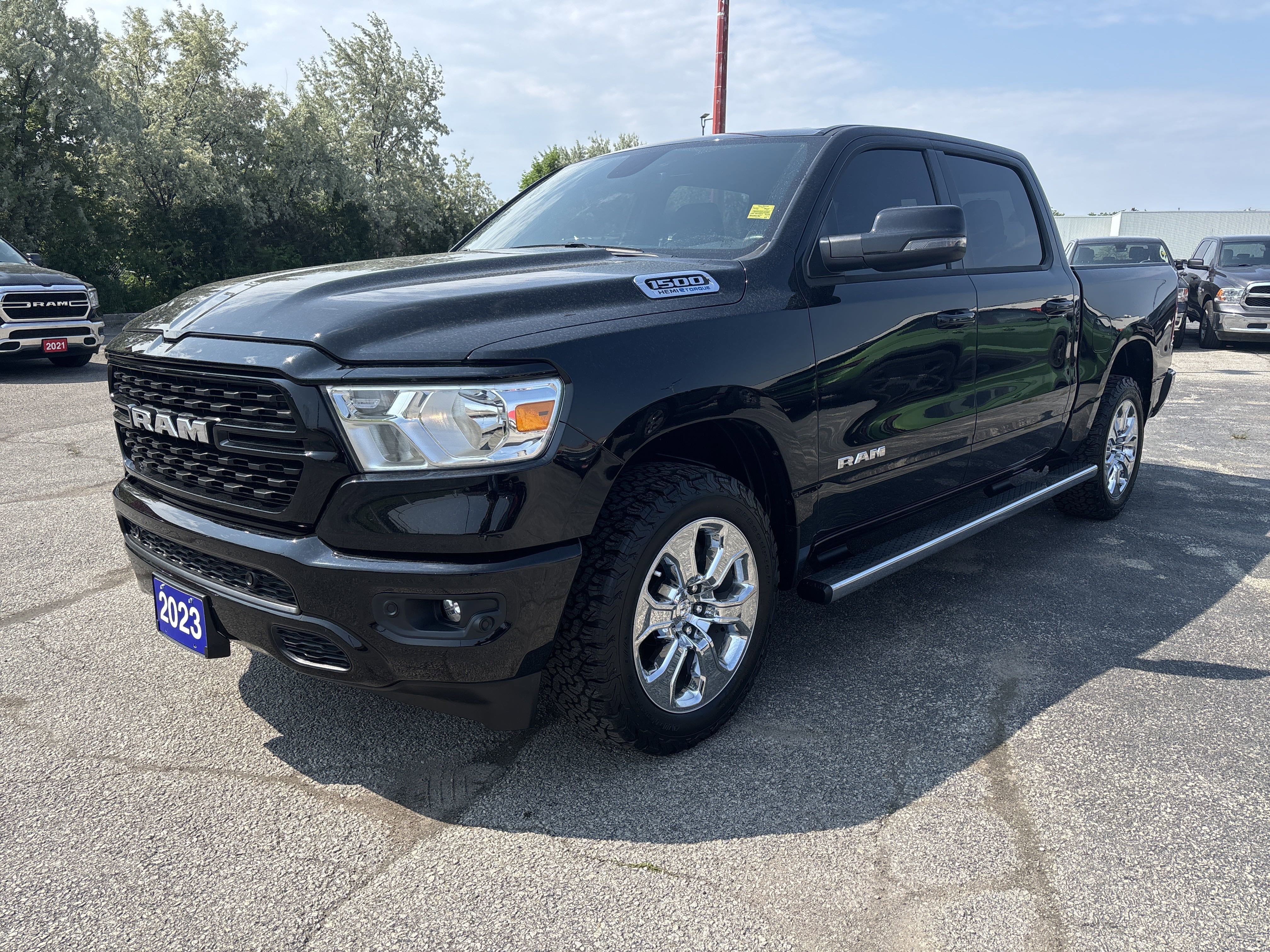 Used 2023 DIAMOND BLACK;BLK W/ BLK SEATS Ram Big Horn image 1