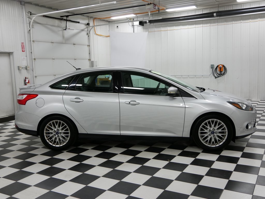 Used 2014 Ford Focus Titanium with VIN 1FADP3J29EL300016 for sale in Rochester, Minnesota