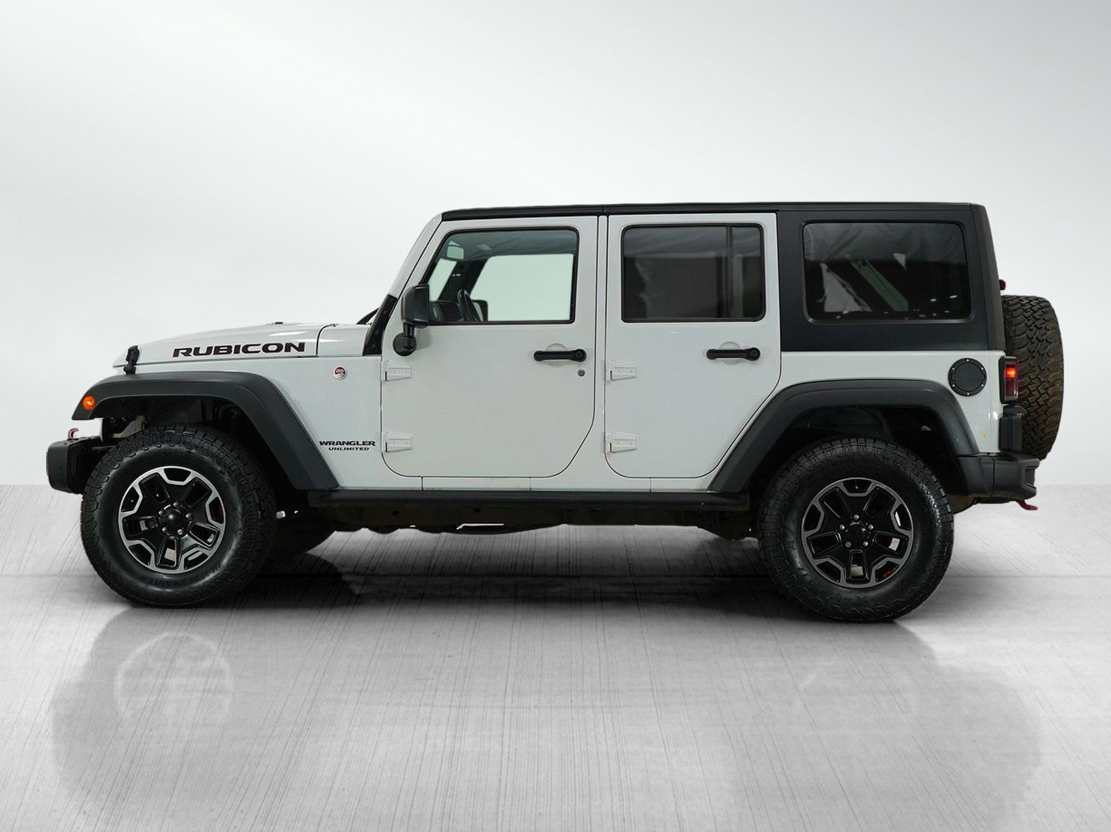 Used 2016 Jeep Wrangler Unlimited Rubicon with VIN 1C4HJWFG2GL131821 for sale in Wayzata, Minnesota
