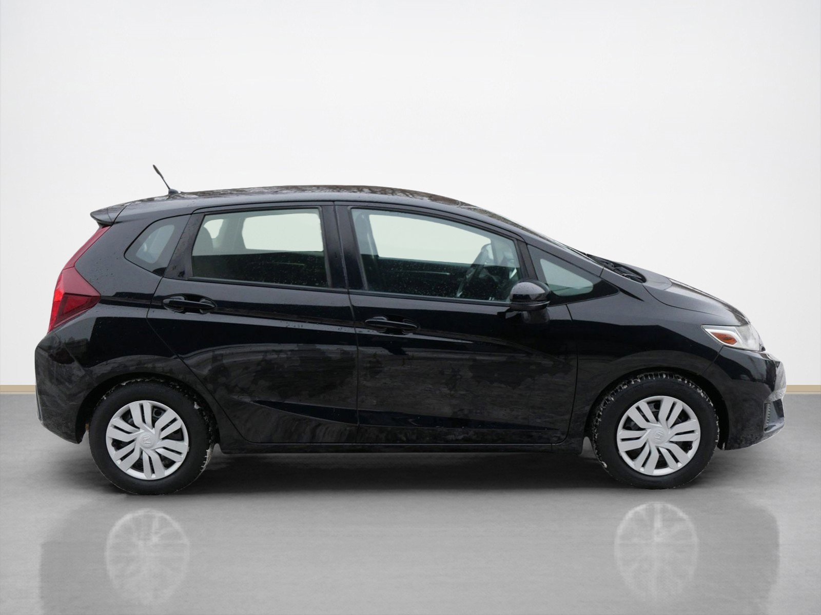 Used 2016 Honda Fit LX with VIN JHMGK5H51GX002751 for sale in Maplewood, Minnesota