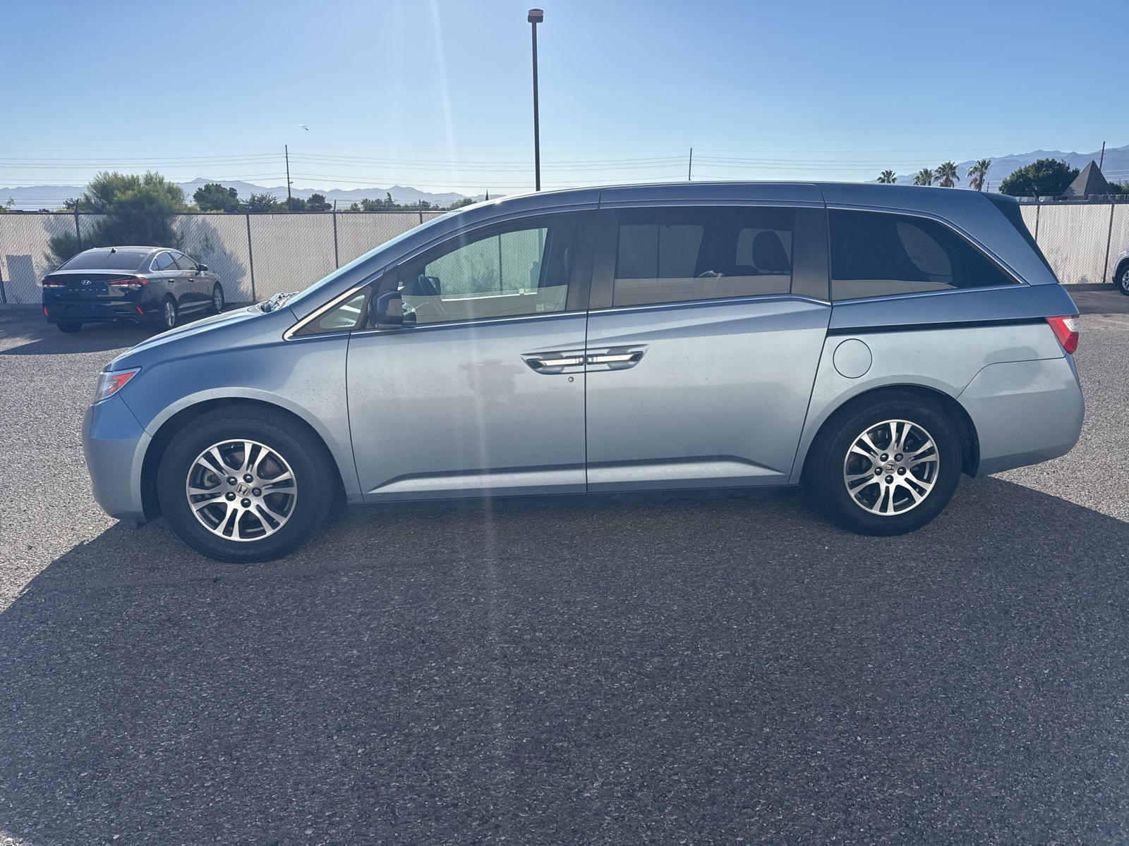 Used 2012 Honda Odyssey EX-L with VIN 5FNRL5H61CB065935 for sale in Kingman, AZ
