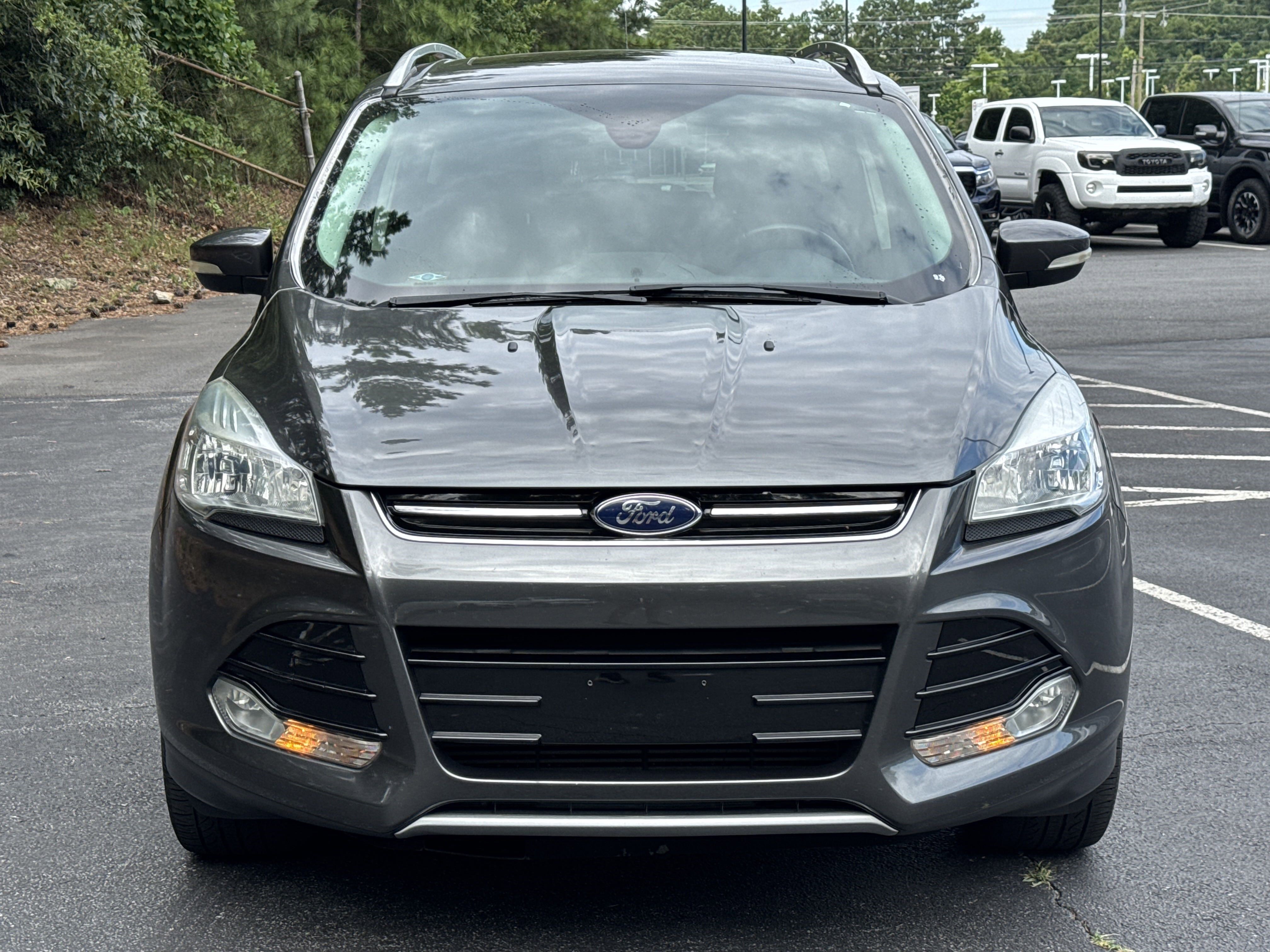 Used 2016 Ford Escape Titanium with VIN 1FMCU0J90GUC34412 for sale in Marietta, GA