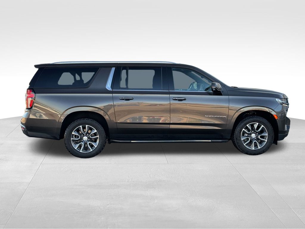 Used 2021 Chevrolet Suburban LT with VIN 1GNSKCKD8MR276696 for sale in Coon Rapids, Minnesota