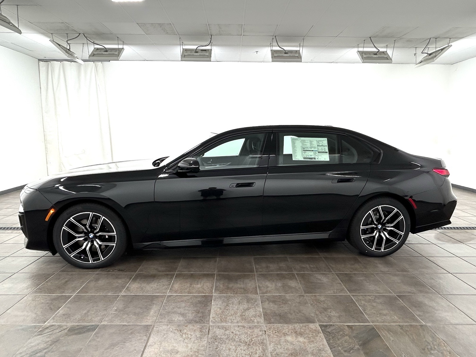 New 2025 Black BMW 740i xDrive image 2