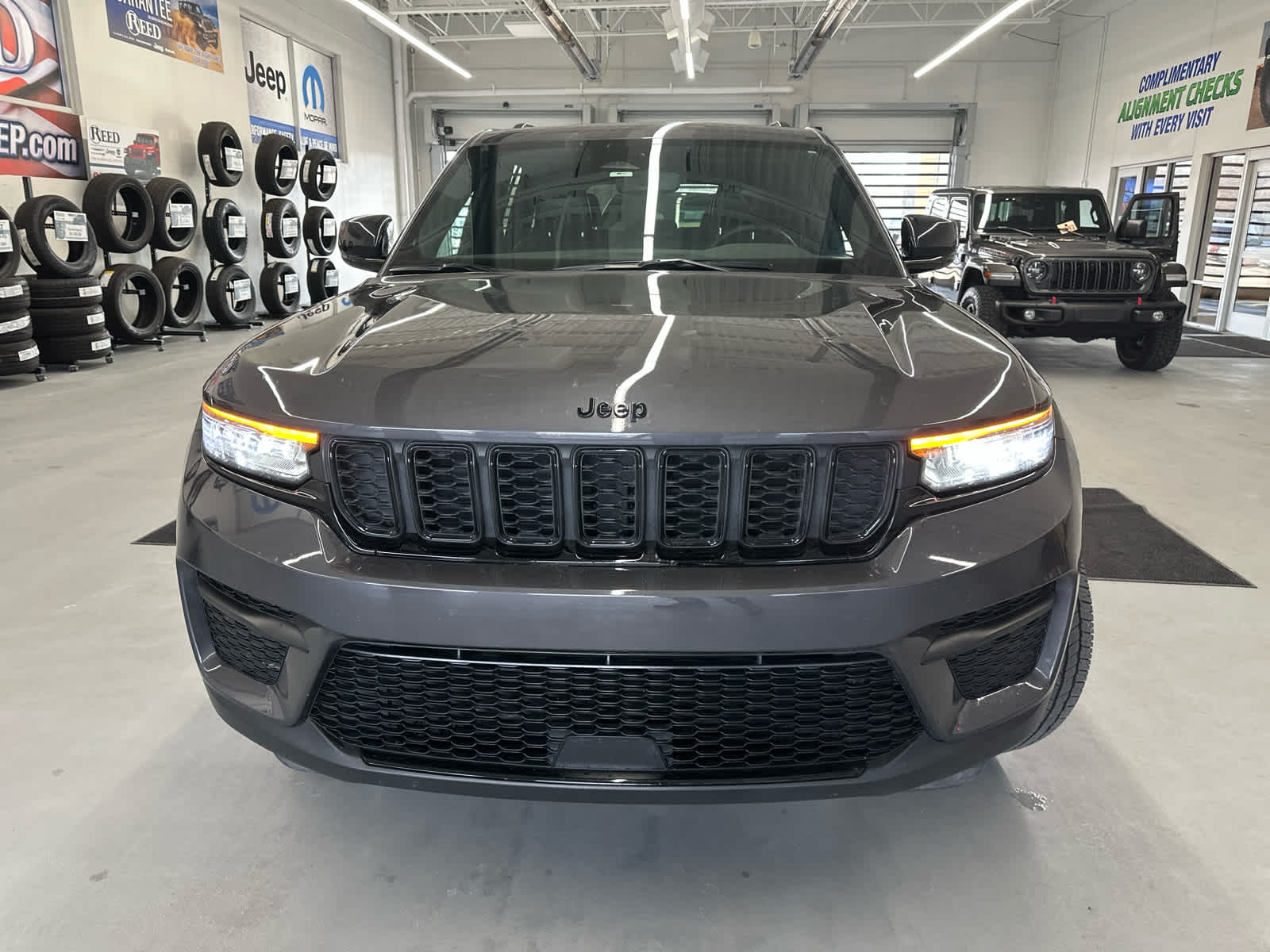 Used 2023 Jeep Grand Cherokee Altitude with VIN 1C4RJHAG7P8704884 for sale in Kansas City