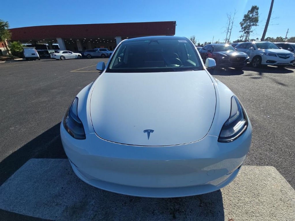 Used 2023 Tesla Model Y Long Range with VIN 7SAYGDEE8PF675801 for sale in Miami, FL