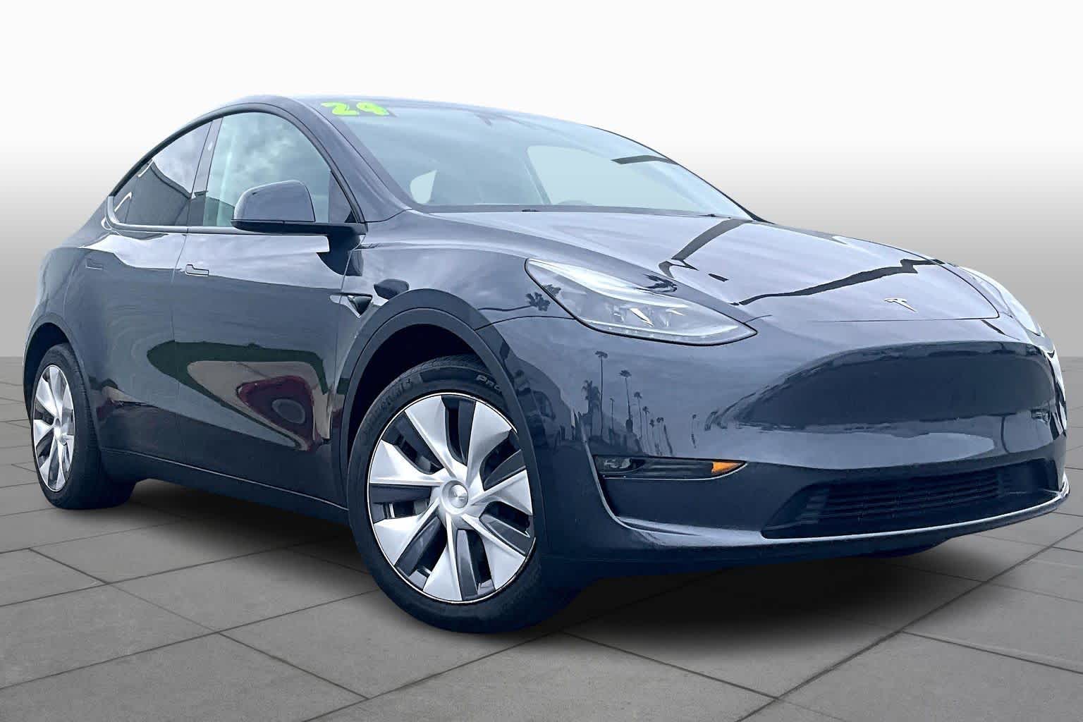 Used 2024 Tesla Model Y Long Range with VIN 7SAYGDEE9RA248563 for sale in Tustin, CA