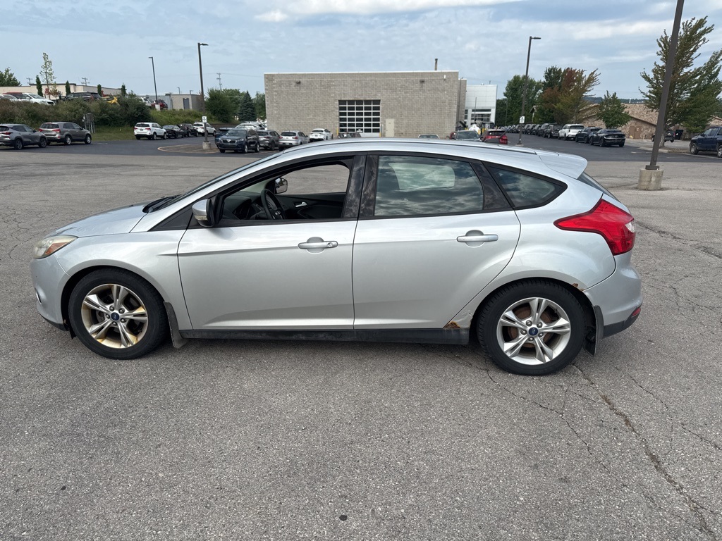 Used 2014 Ford Focus SE with VIN 1FADP3K21EL254566 for sale in Traverse City, MI