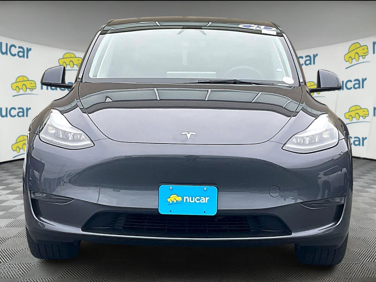 Used 2023 Tesla Model Y Long Range with VIN 7SAYGDEE6PA168666 for sale in Kansas City