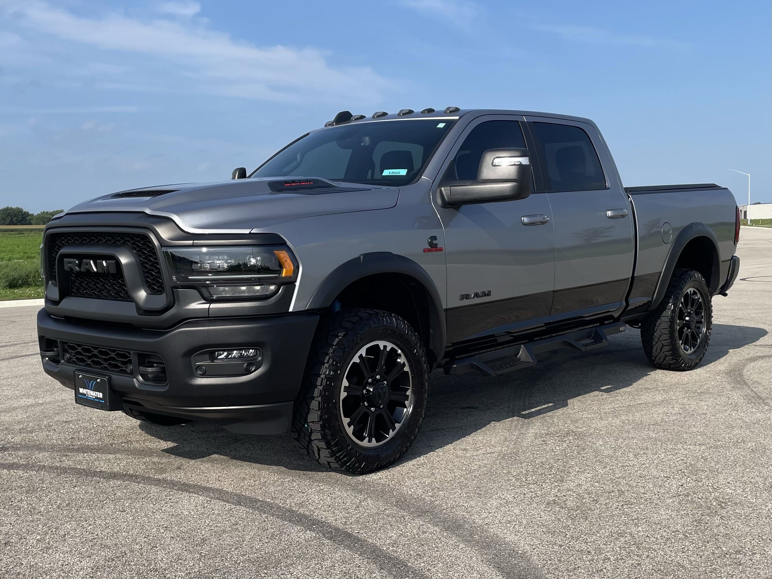 Used 2024 RAM Ram 2500 Pickup Rebel with VIN 3C6UR5EL3RG213015 for sale in Burnsville, Minnesota