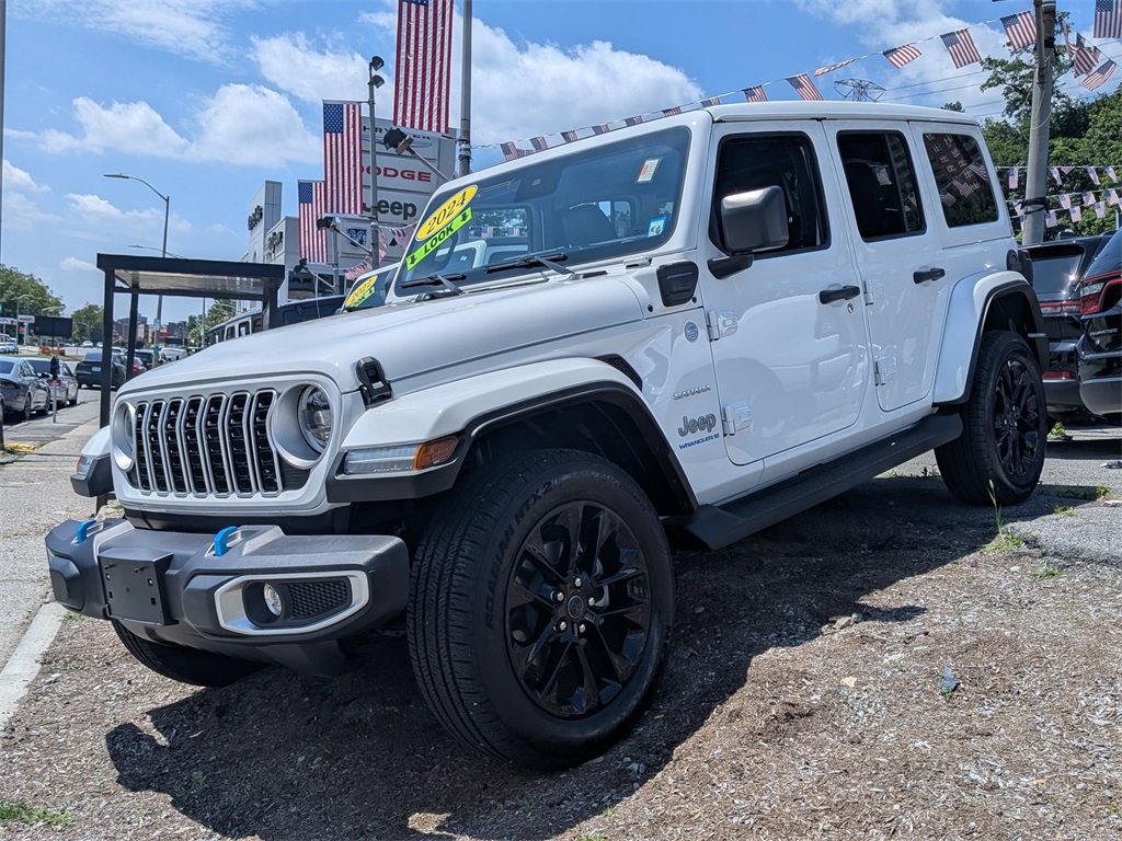 Used 2024 White Jeep Sahara 4xe image 1