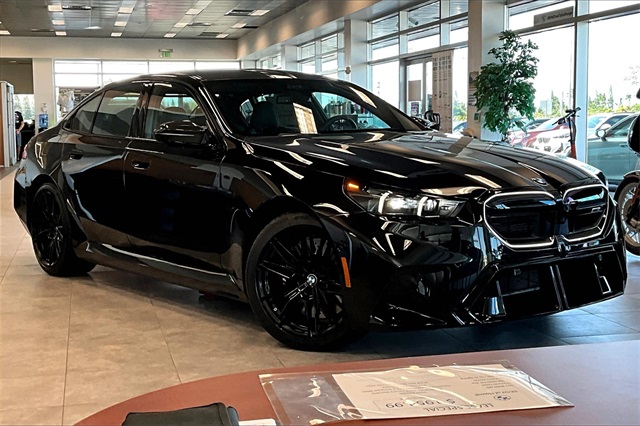 New 2025 Black Sapphire Metallic BMW Base image 1