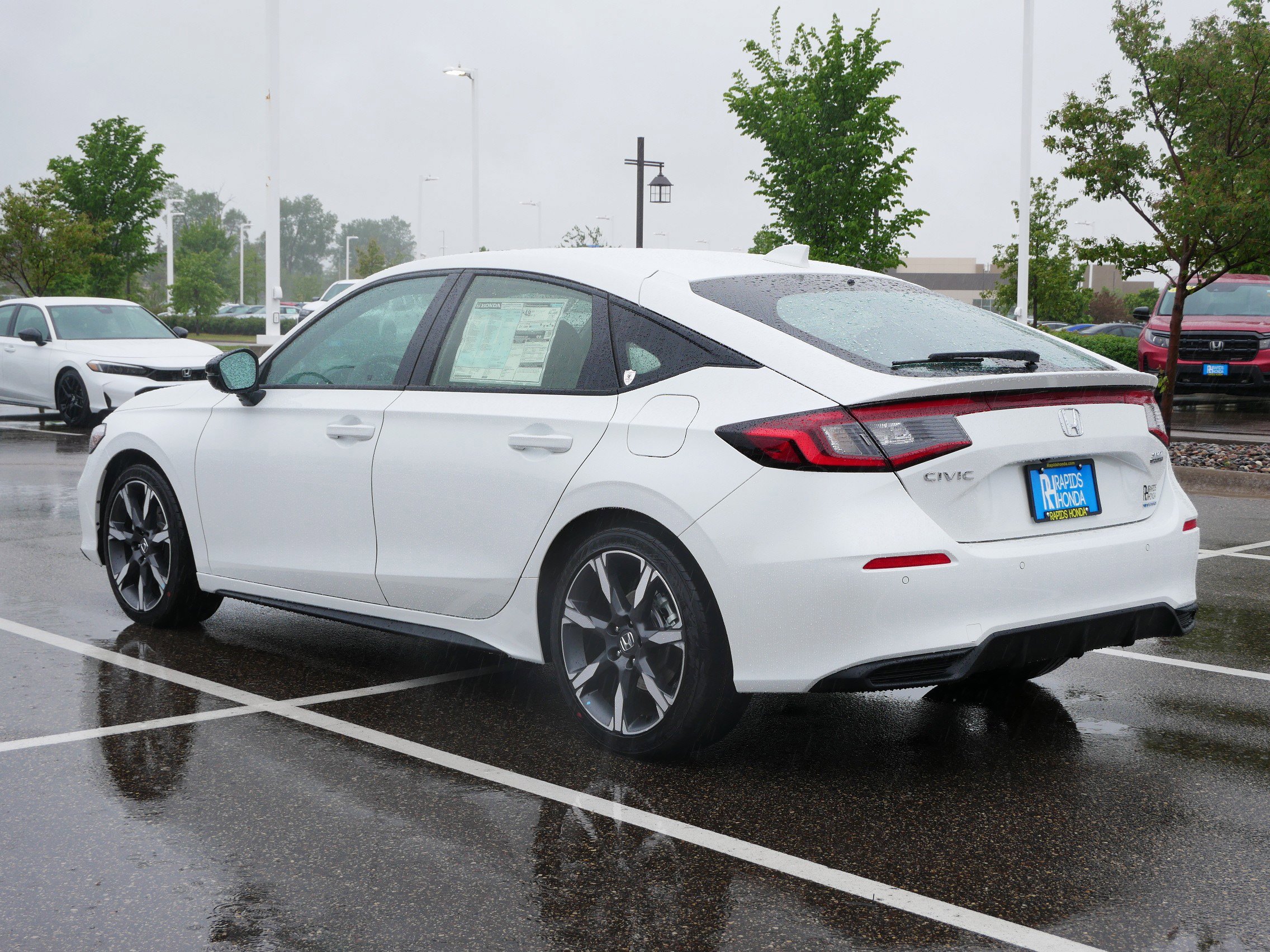2026 Honda Civic Hatchback Touring Hybrid photo 2
